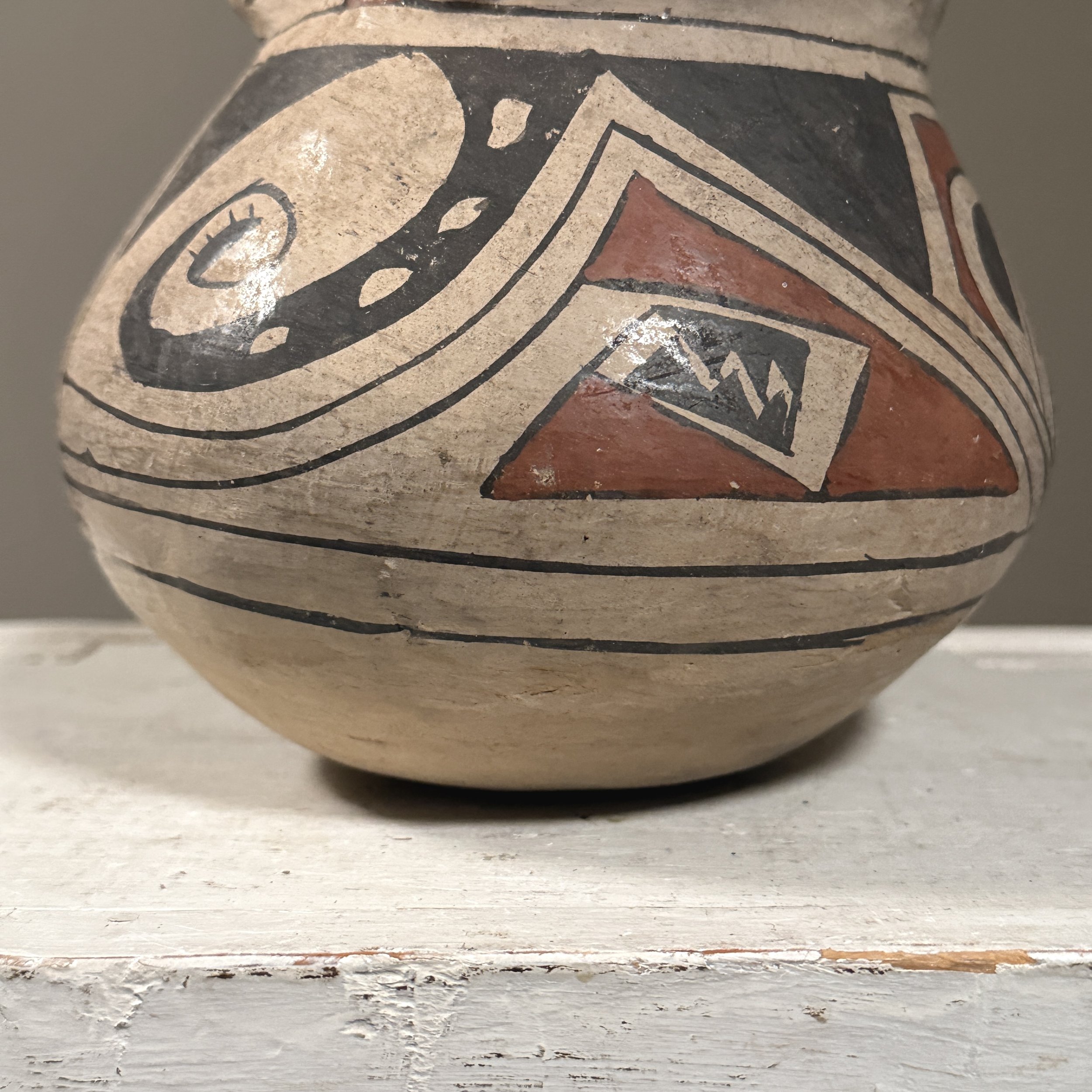 Surface wear on antique clay vessel