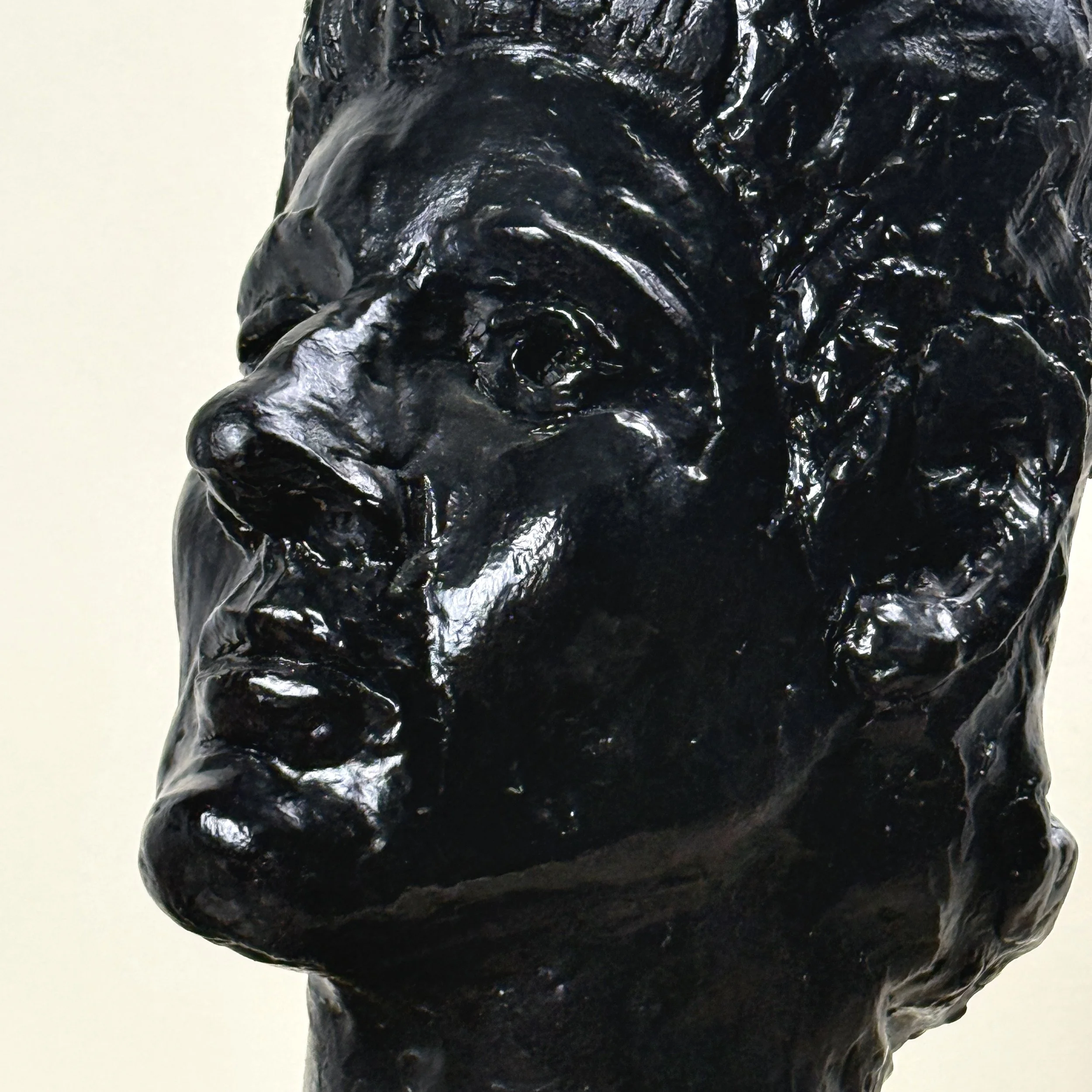 Face detail. Stylized features. Expressionist aesthetic.