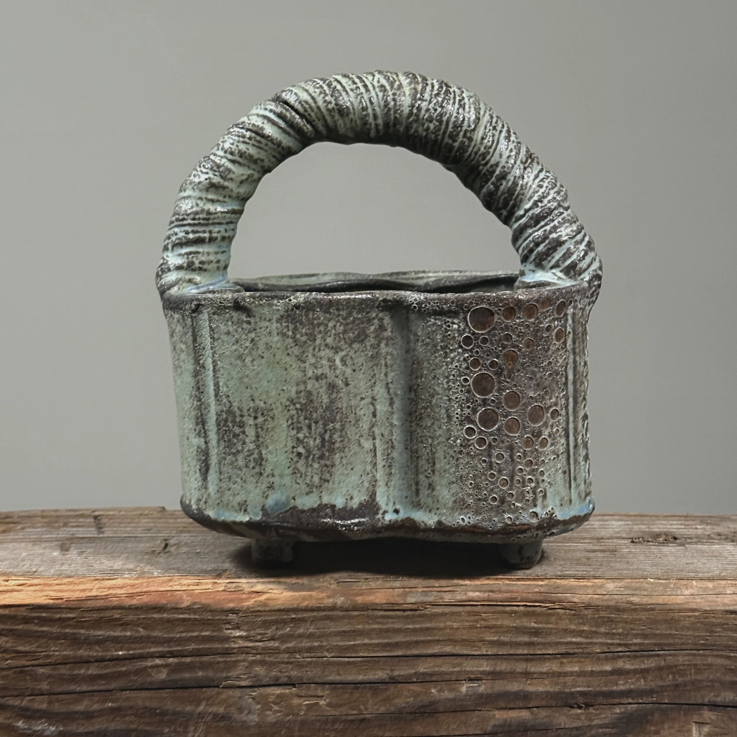 Seiko Kato Behr greenish-blue glazed stoneware vessel with hand-coiled handle