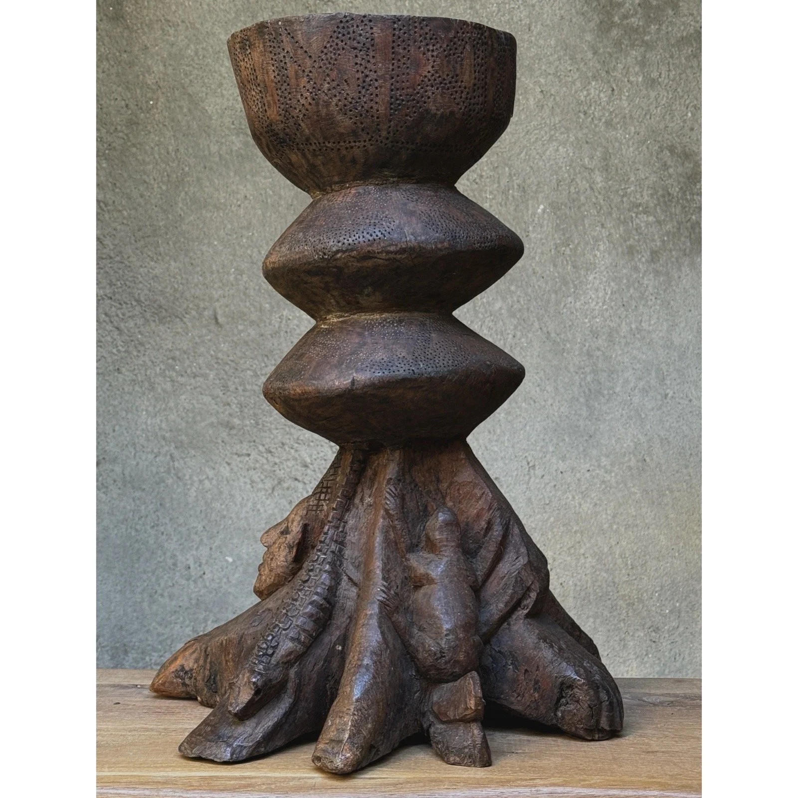 Vintage hand-carved folk art wooden sculpture, back view