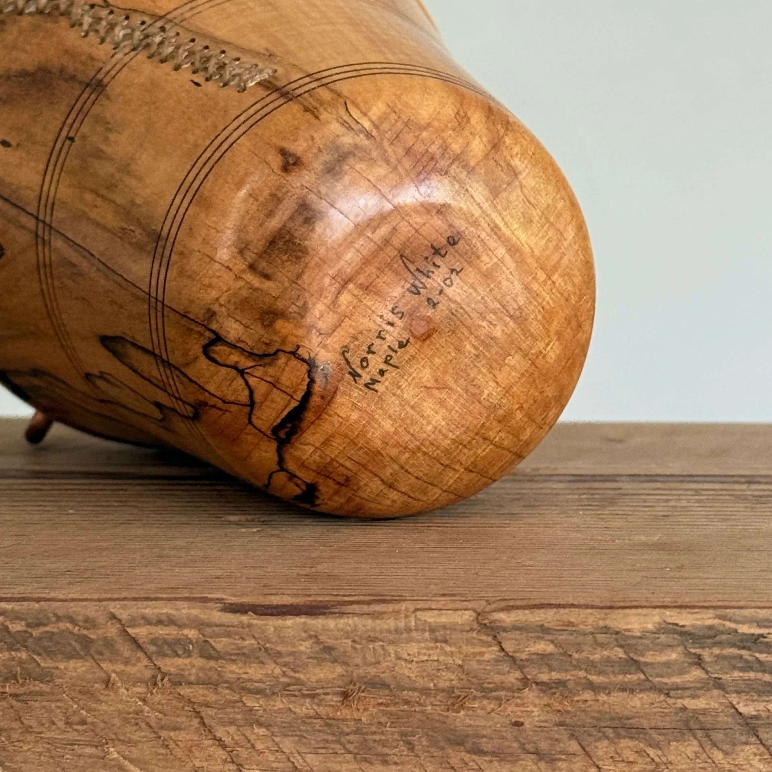 Signed bottom of Norris White turned wood vessel