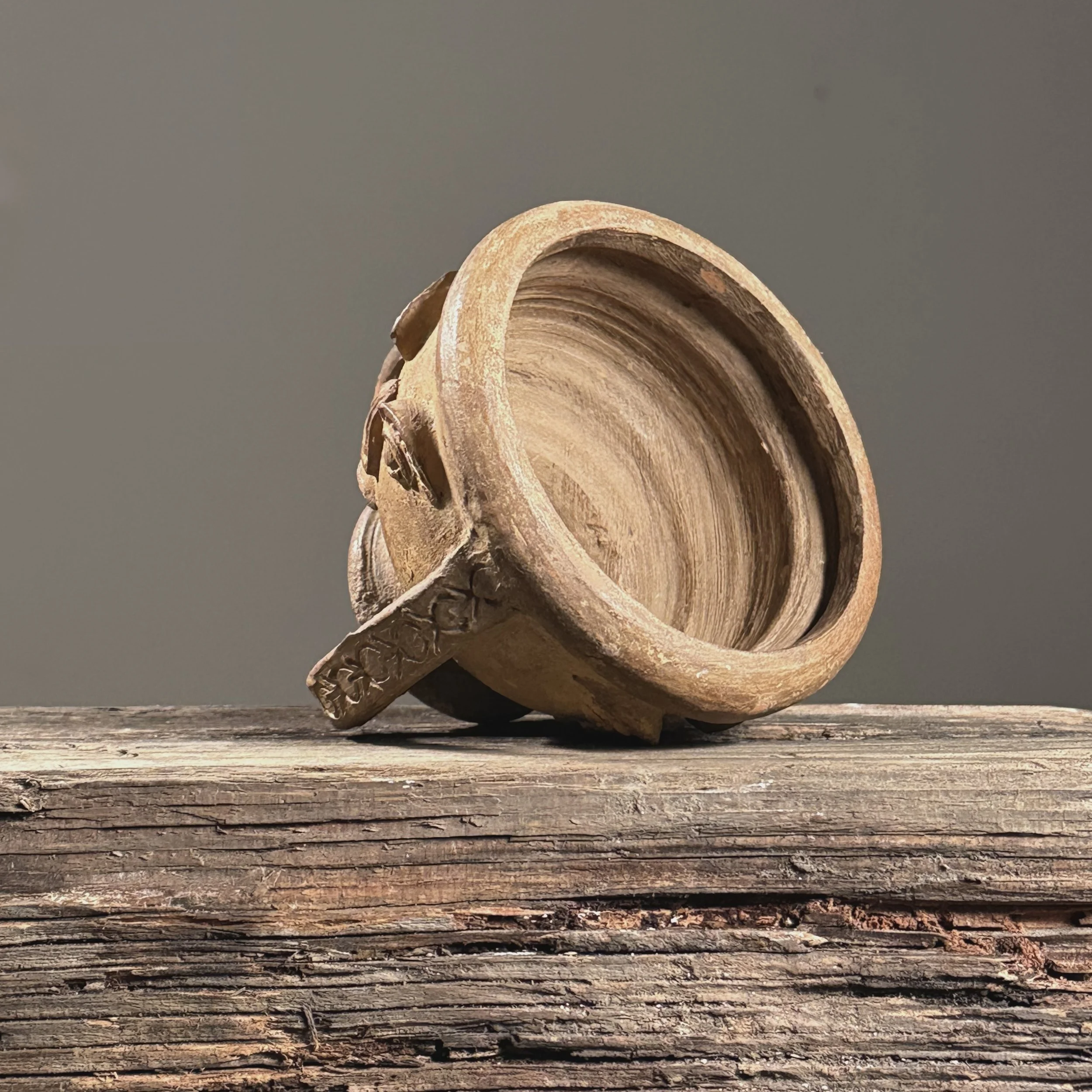 Top view of bowl opening. 4.25 inch diameter. Plain interior.