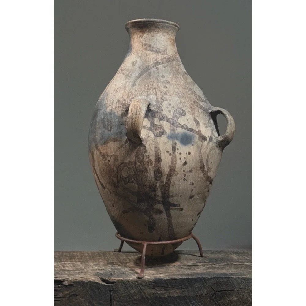Vintage Tonaltepec amphora-style handled clay vessel on custom metal stand