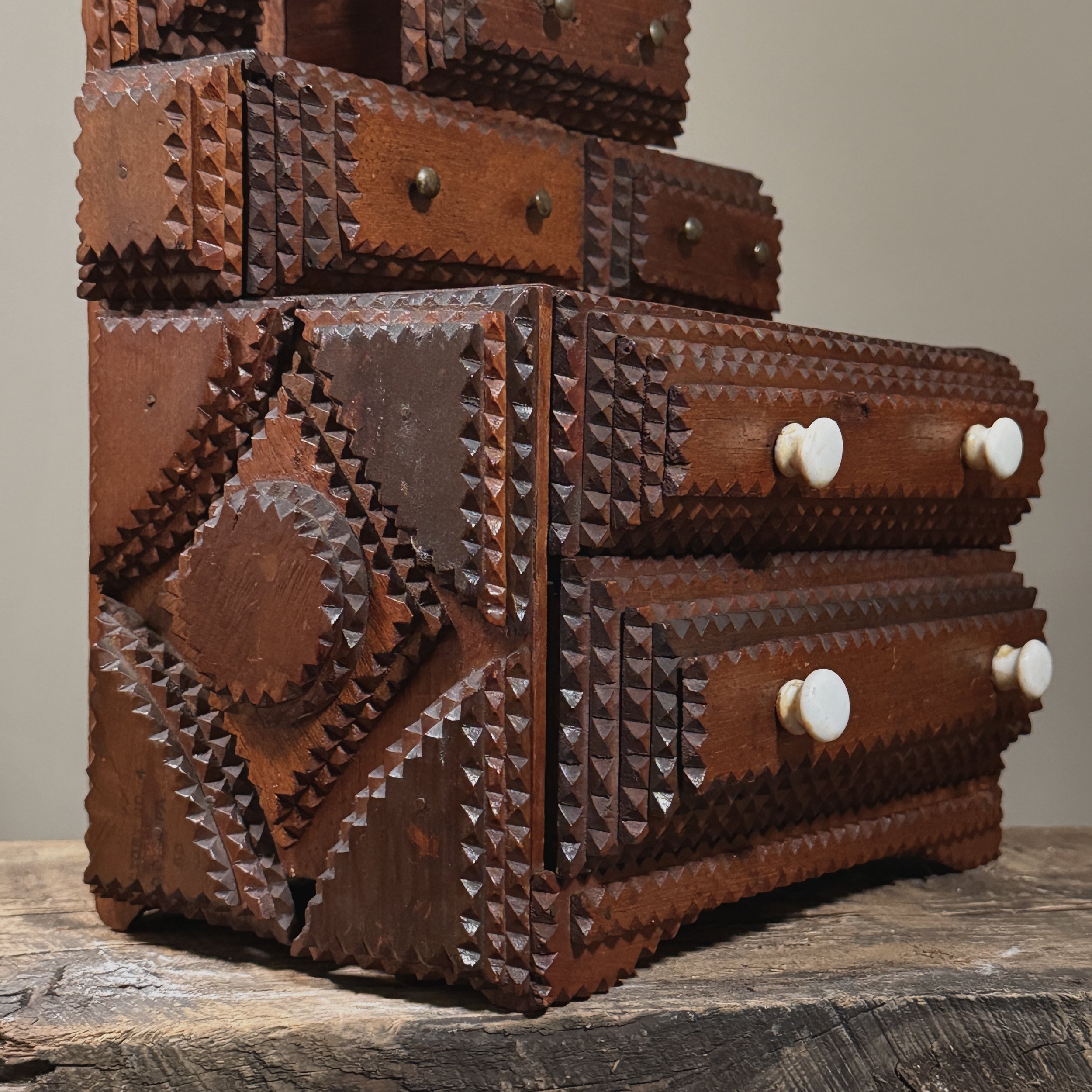 Detail of the chip-carved and layered wooden surface.