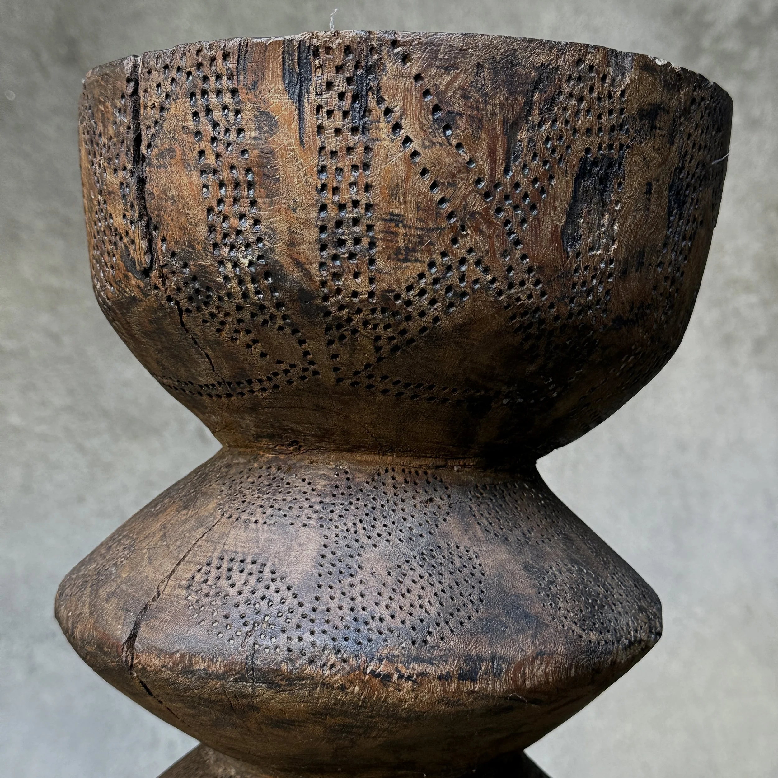 Textural stippled carving on vintage wood piece