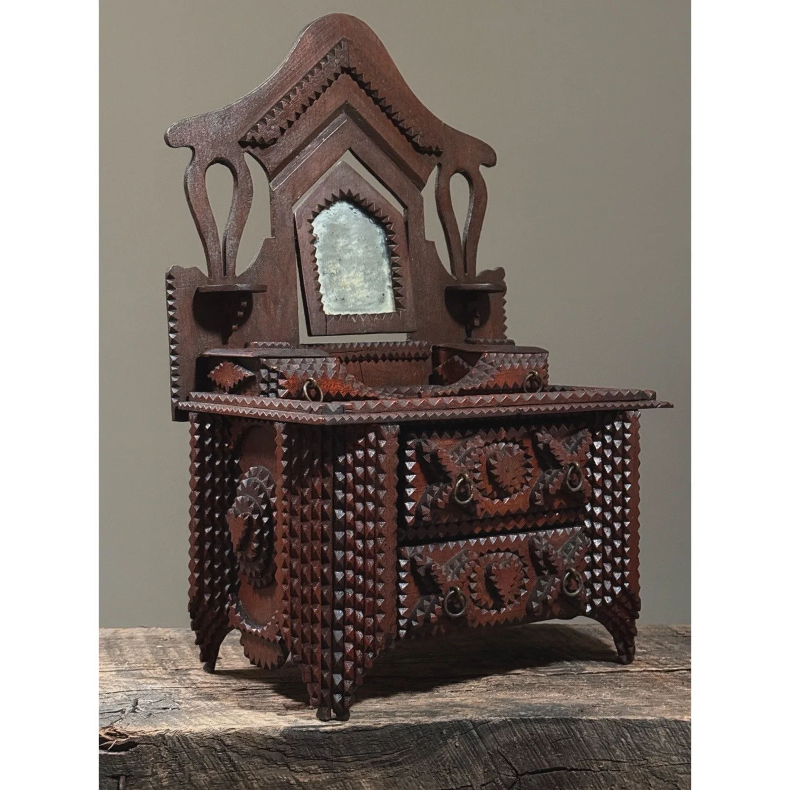 Overall angled view highlighting layered chip carving construction