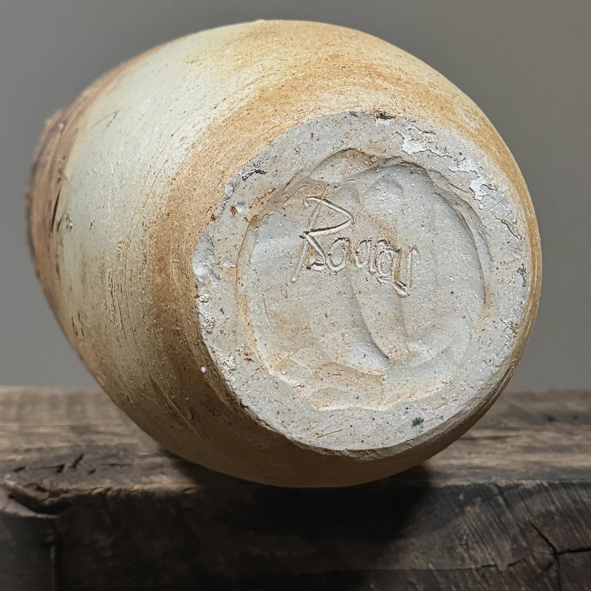 Base detail of signed vintage ceramic vase