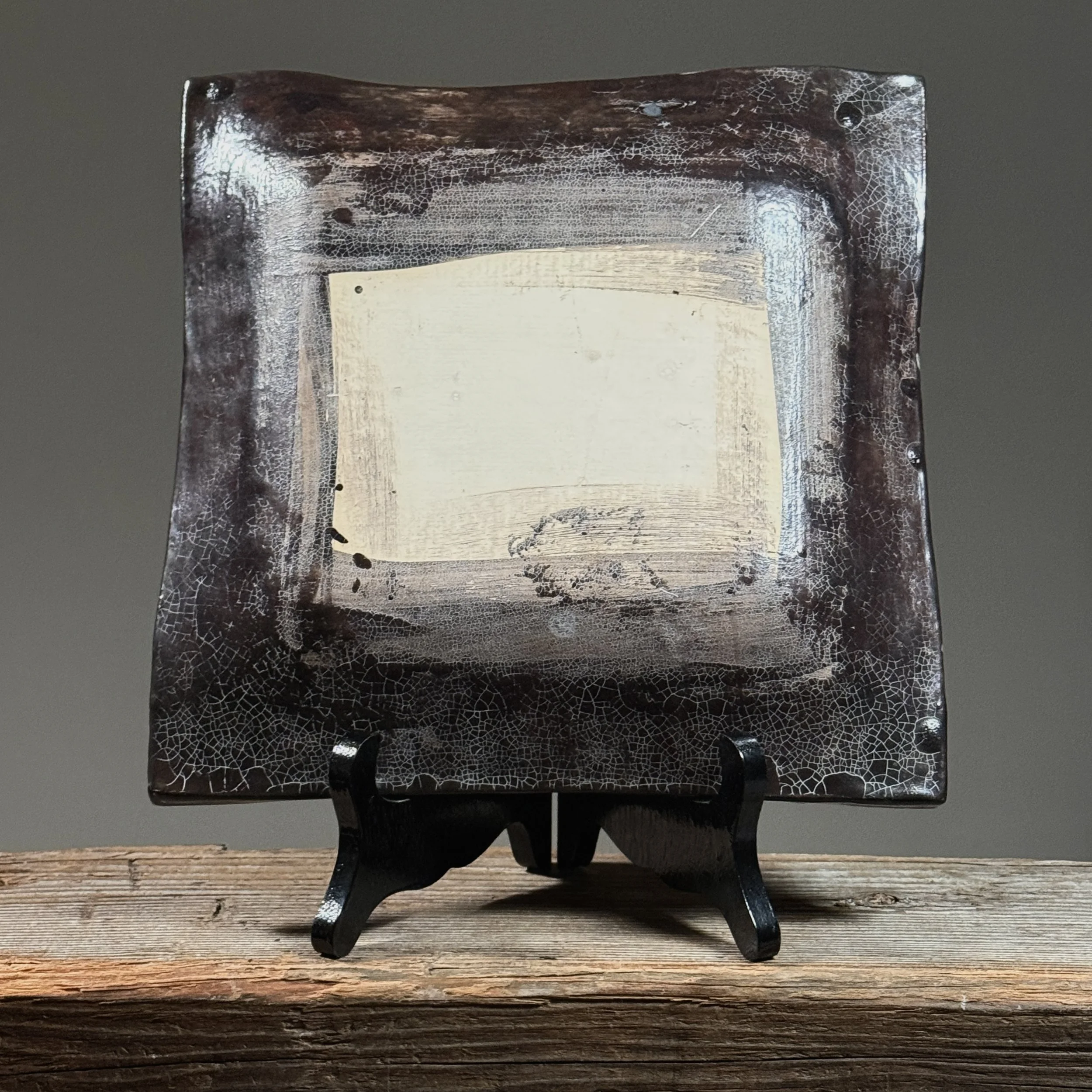 Verso of plate. Artist signature impressed or inscribed en verso.