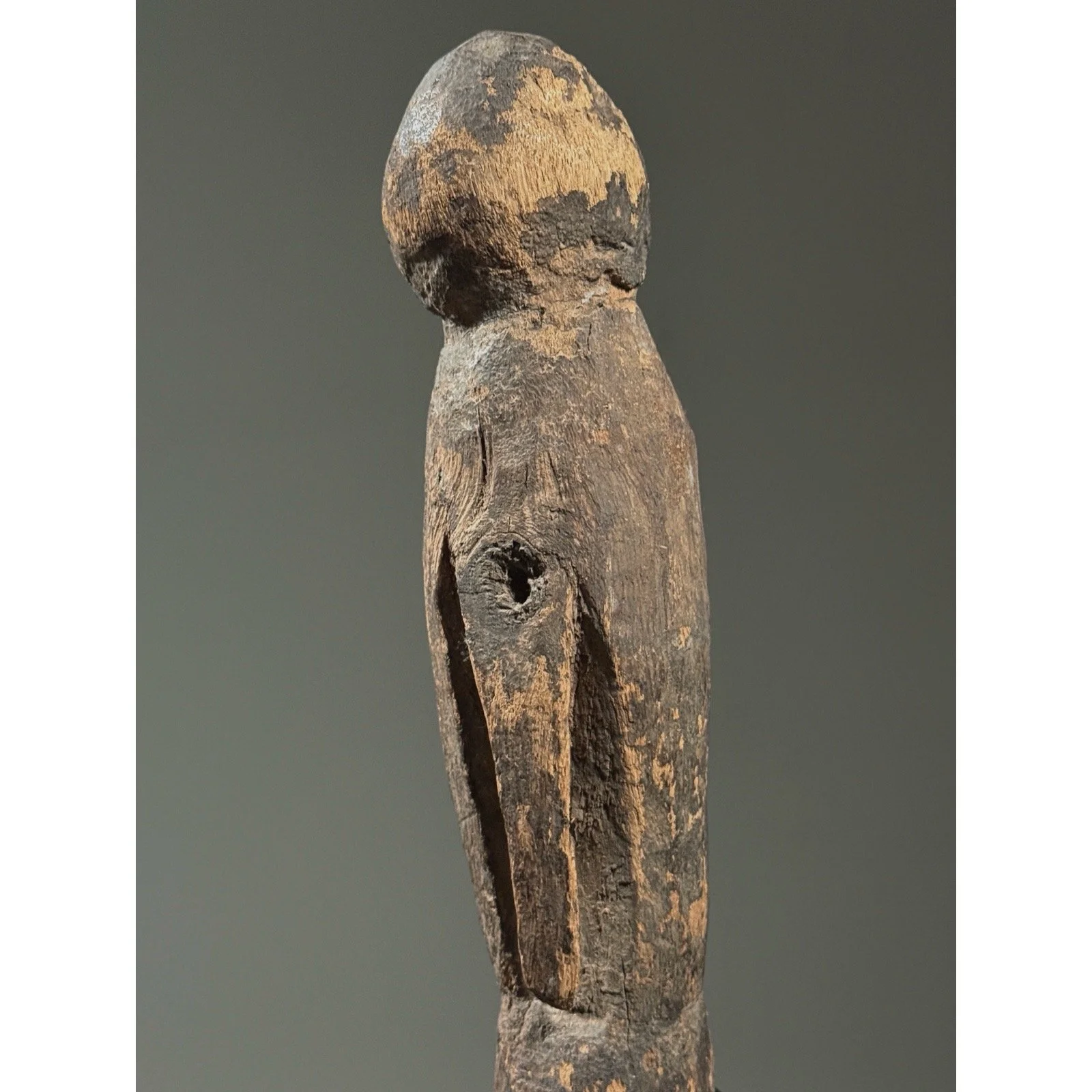 Macro detail of the wood grain and patina developed through decades of handling and exposure