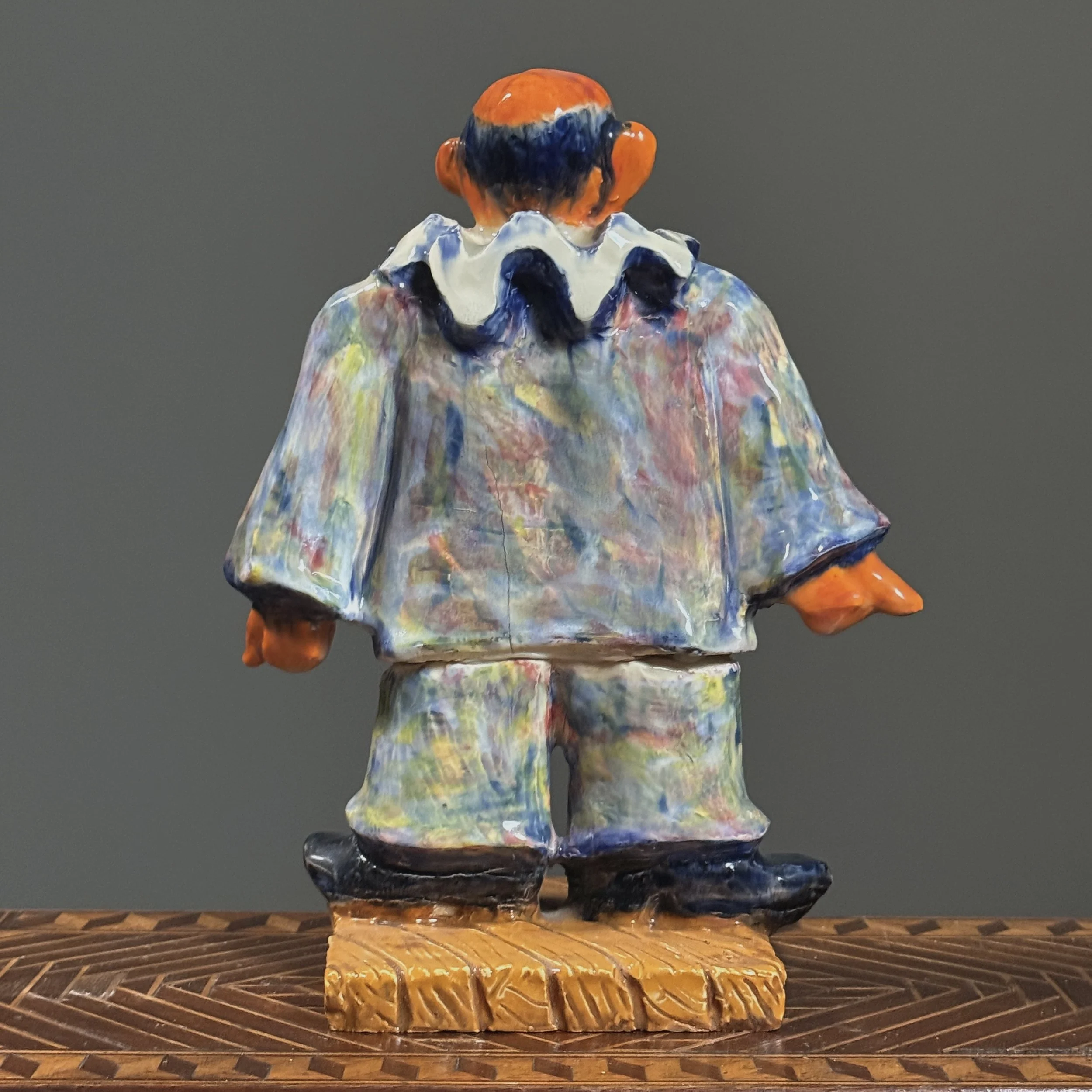 Rear view of the sculpture, showing the treatment of the form and the glaze application on the back