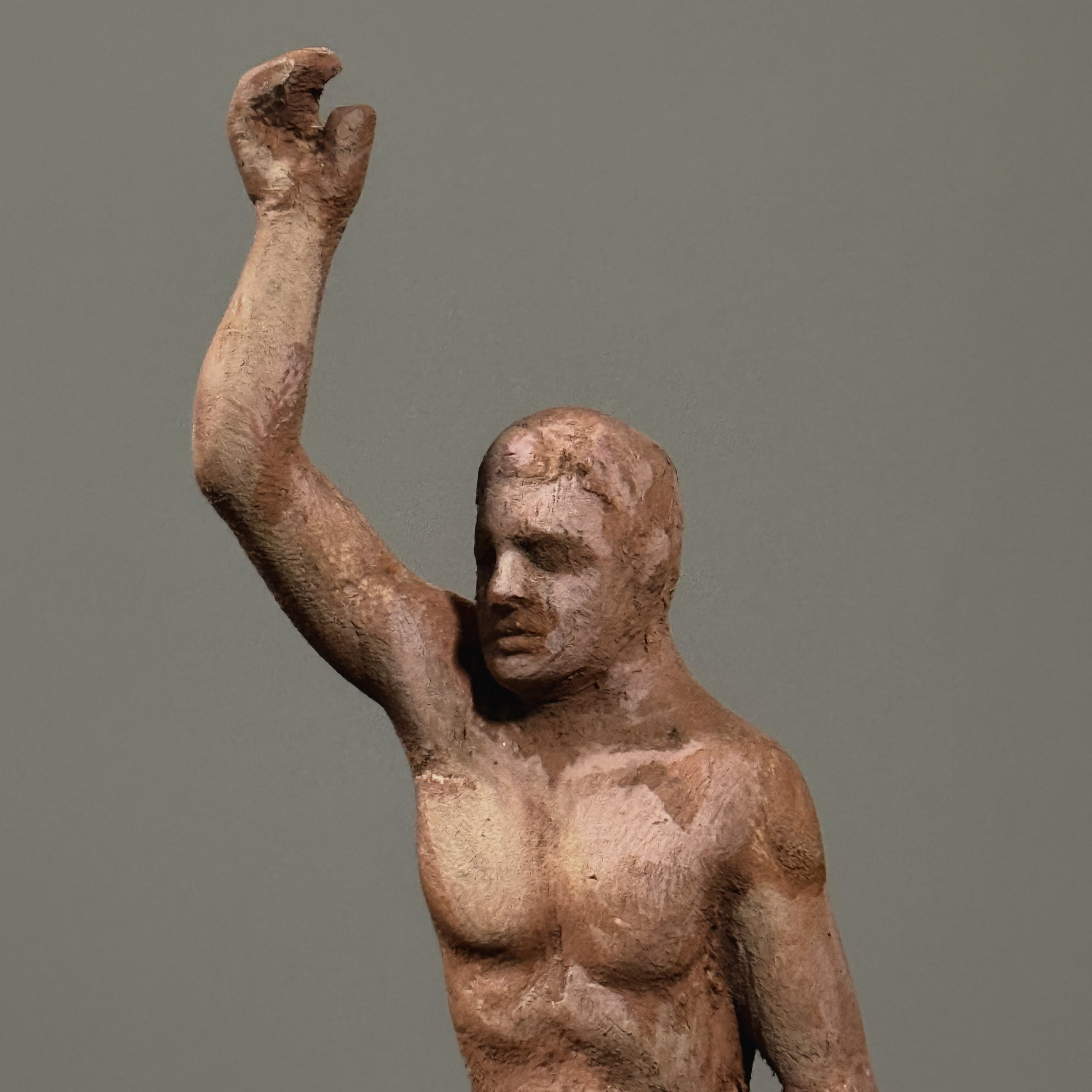 Vintage hand carved wood sculpture with raised arm detail