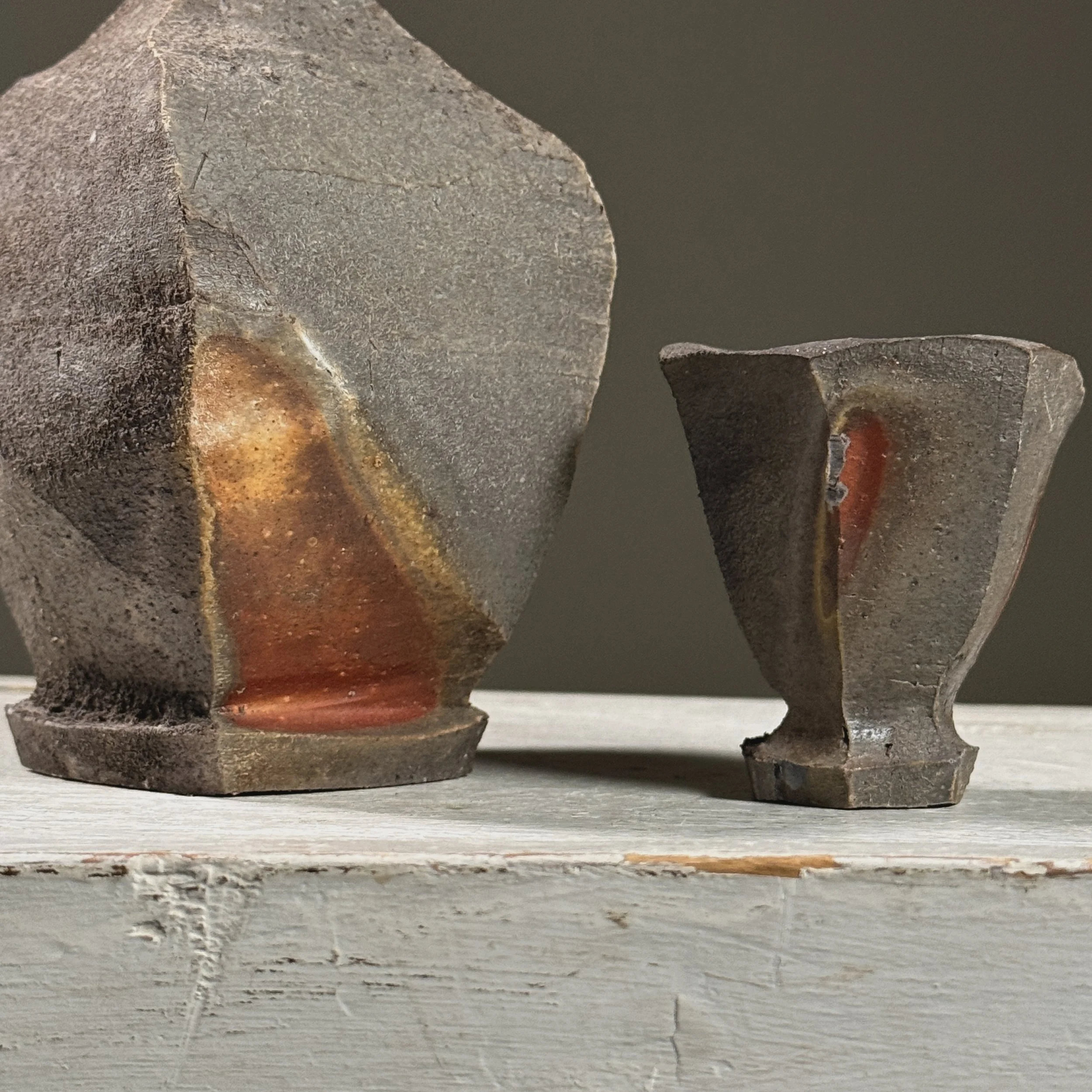 Close-up of wood-fired surface effects on one tokkuri.