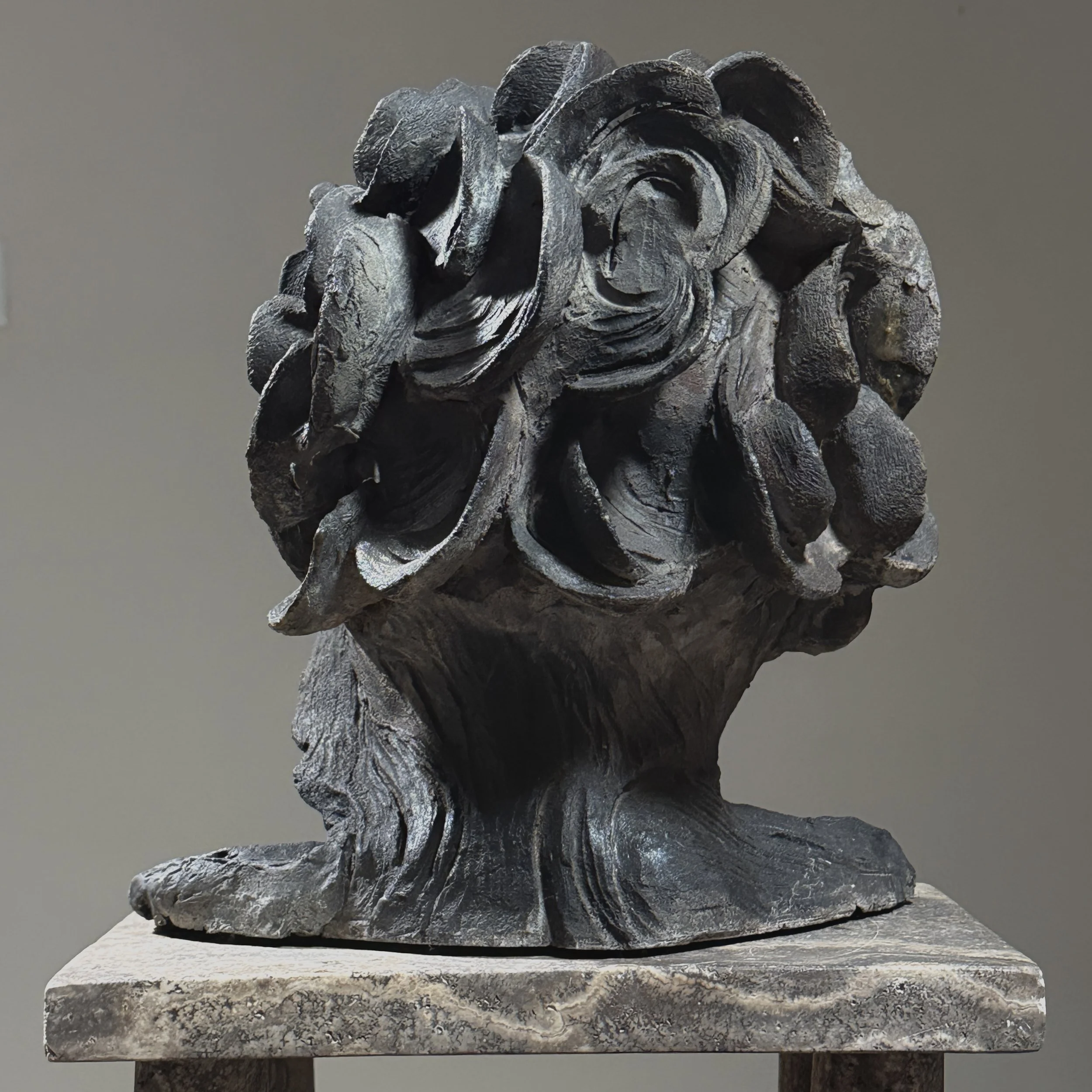 Back of sculpture. Brutalist form. Wear consistent with age.
