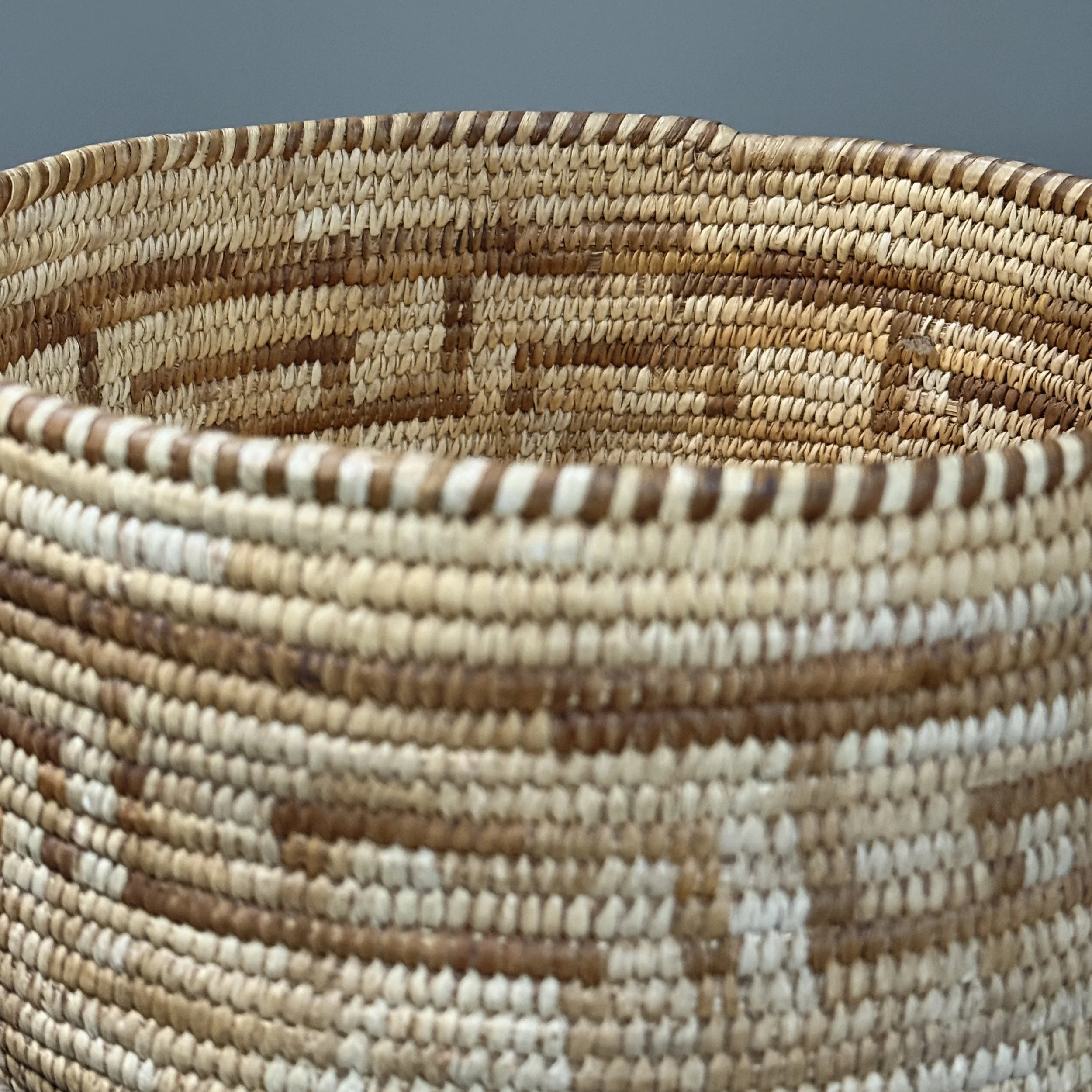 Detail of coiling technique and stitch construction.