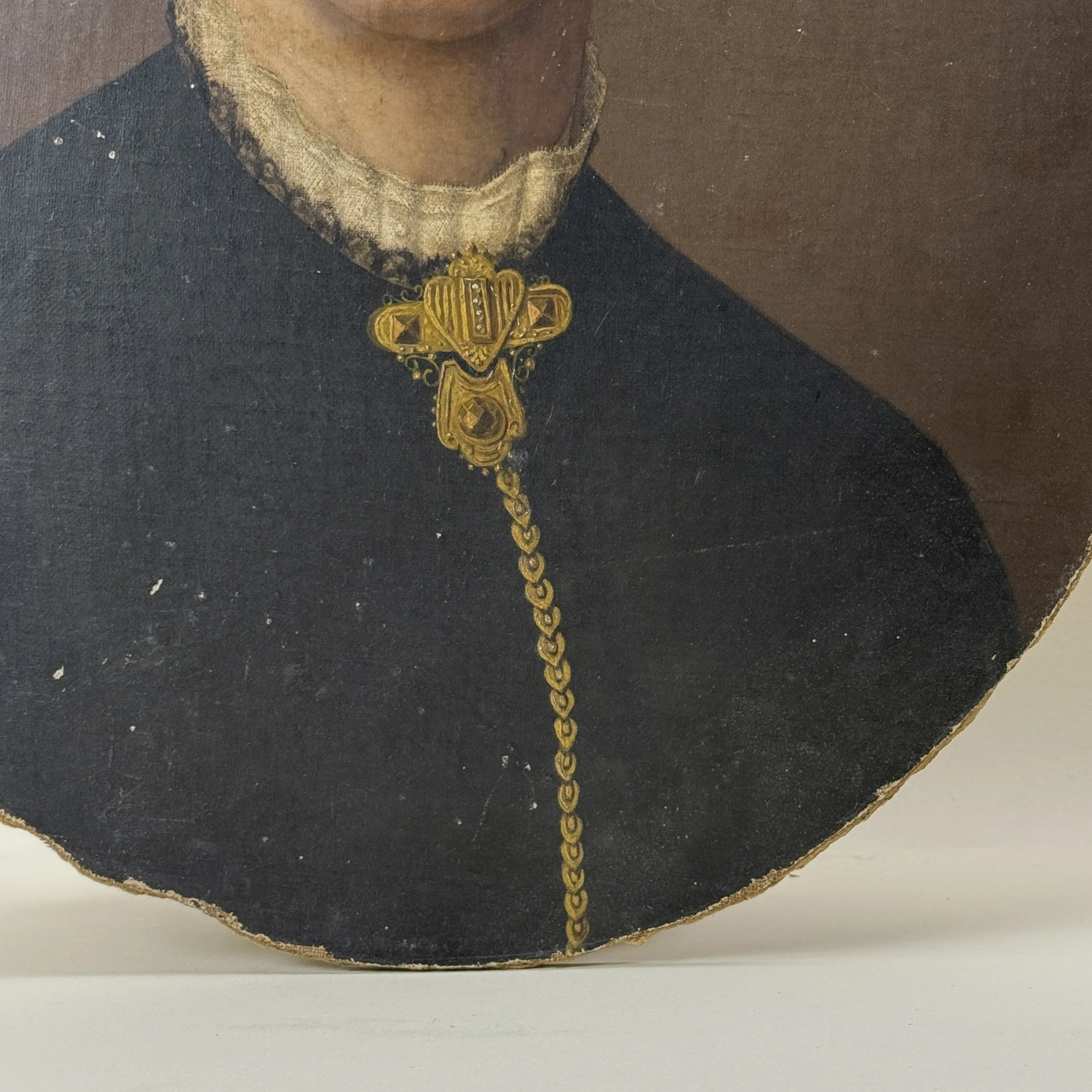 Necklace detail. Intricate gold jewelry. Victorian adornment.