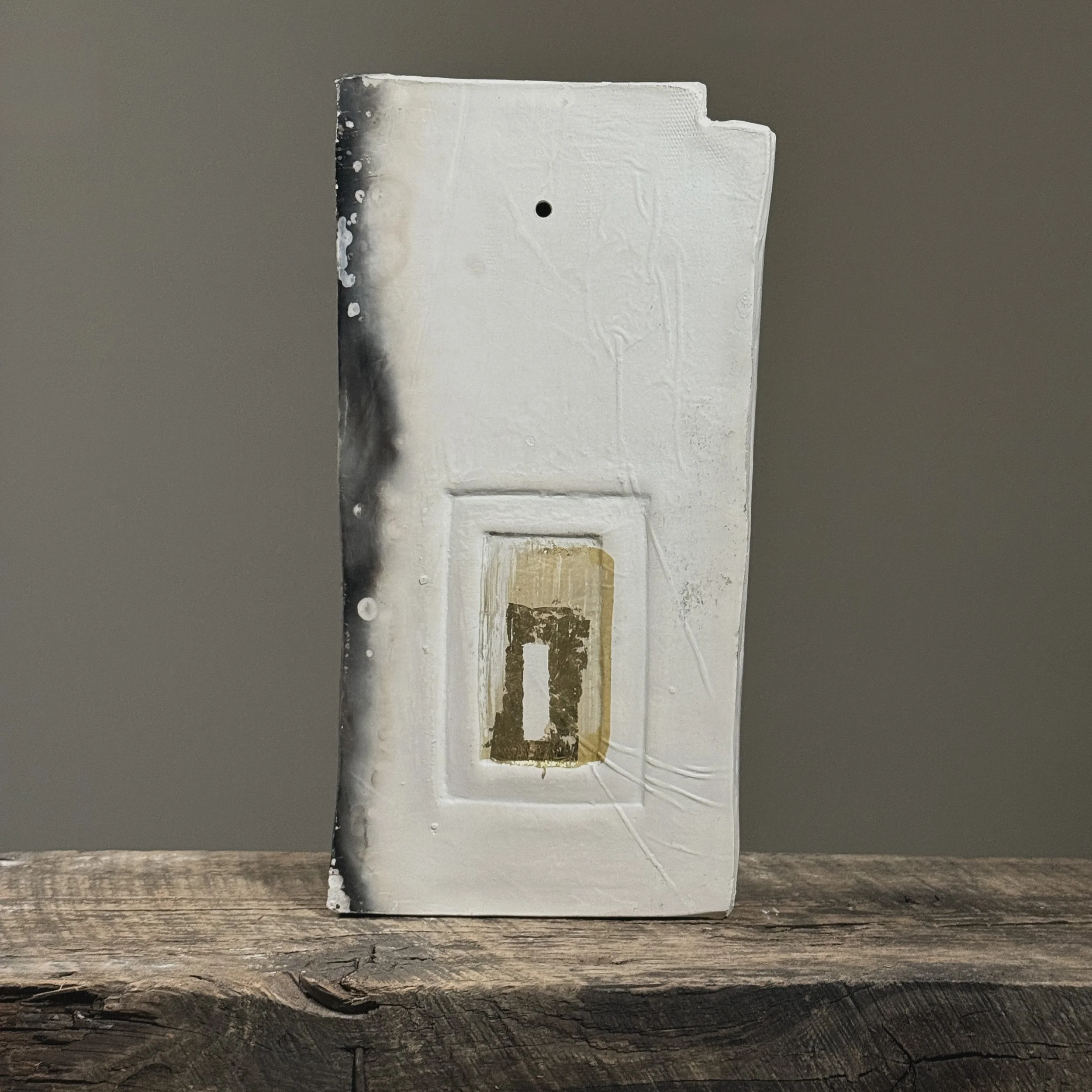 Tall narrow raku-fired sculpture back view