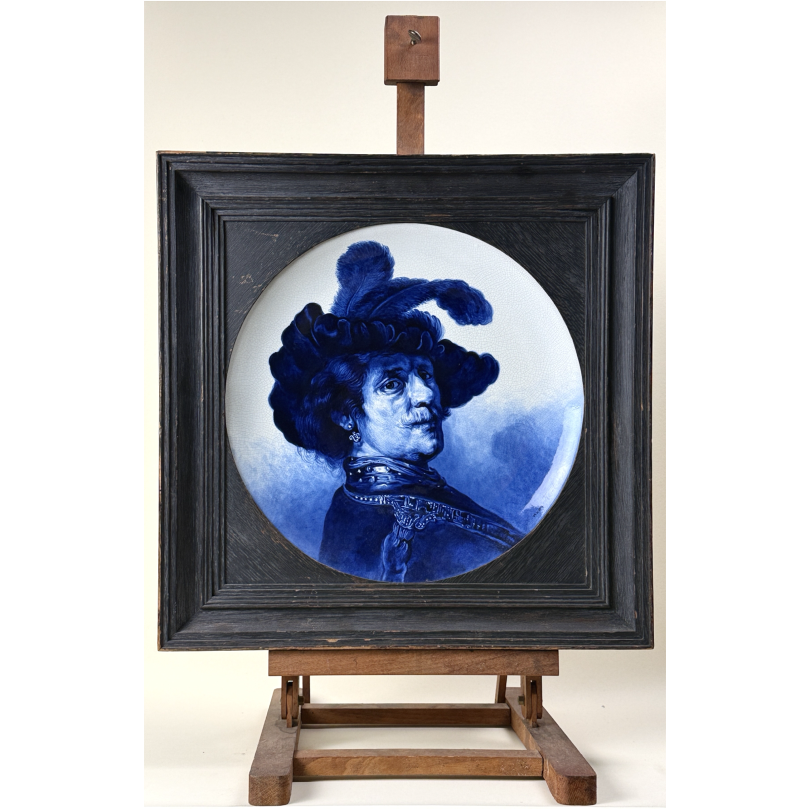Antique 19th century Delft porcelain tondo charger. Portrait after Rembrandt. 13.5 inch diameter.