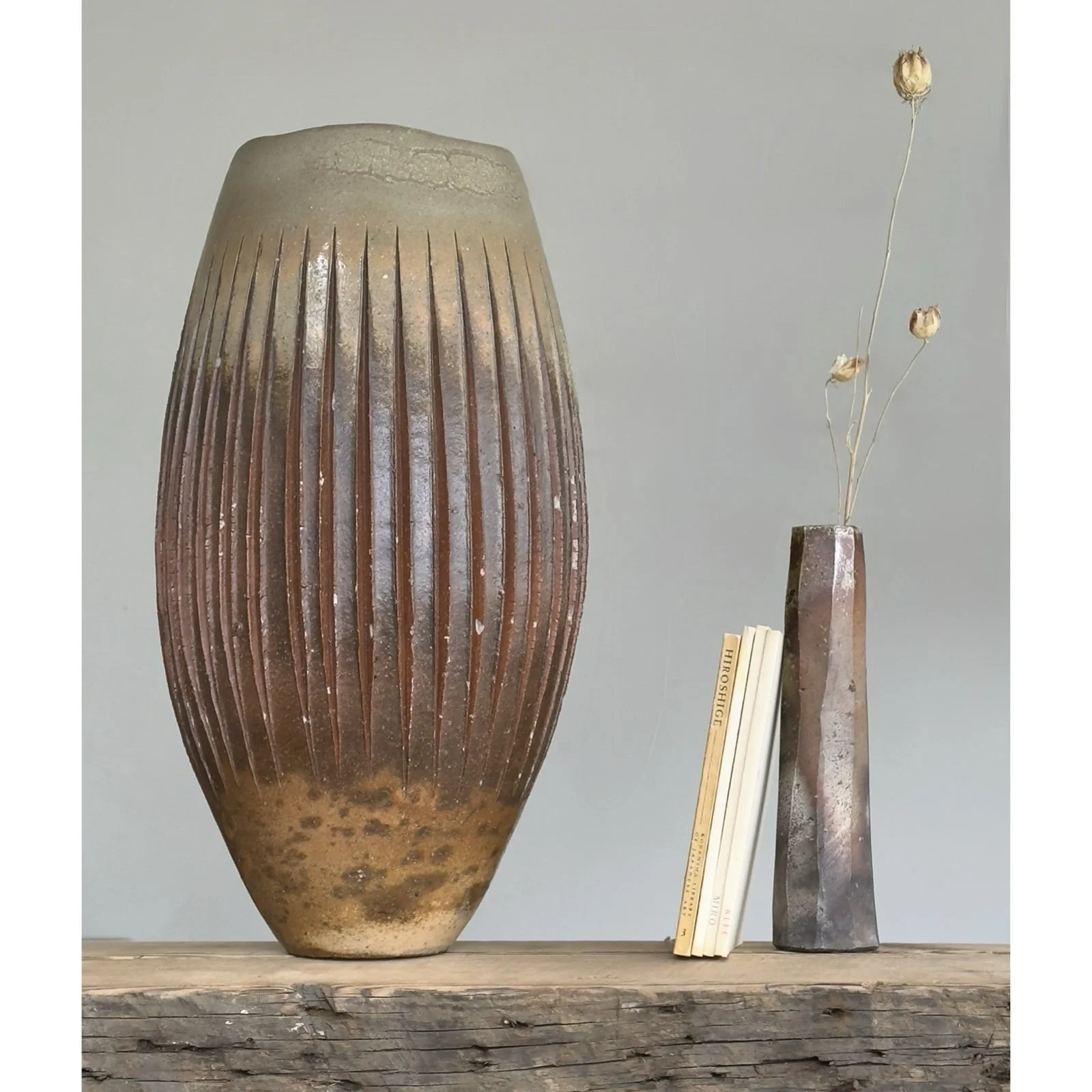 Vignette with Japanese modernist wood fired stoneware vessel, signed
