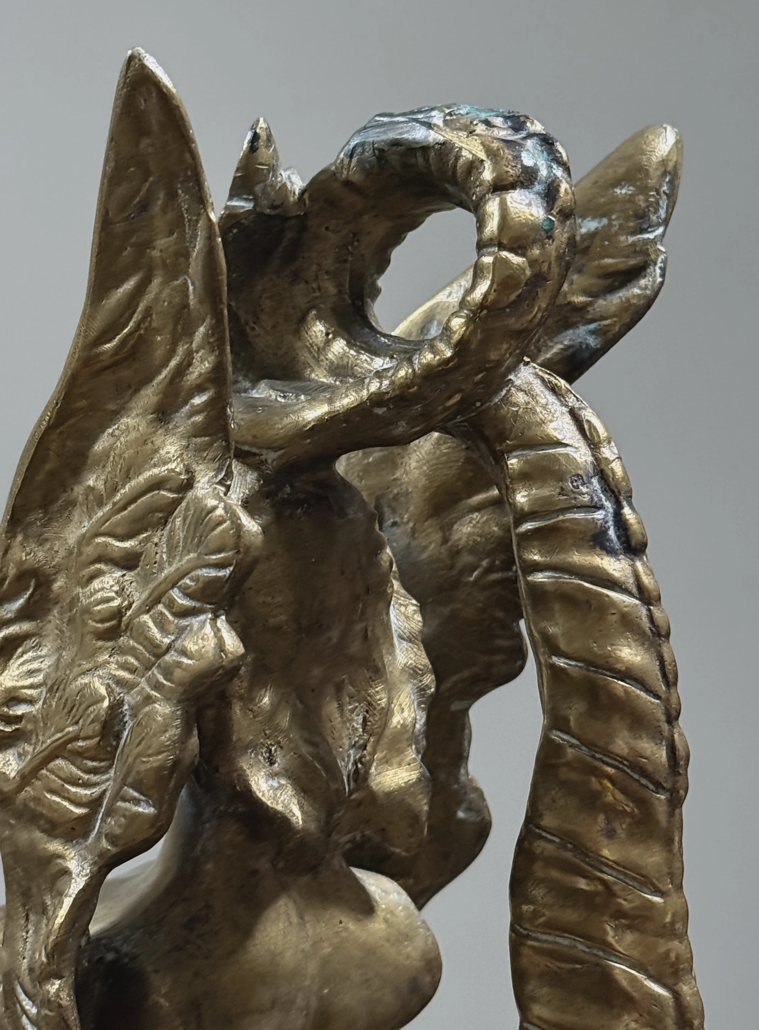 Detail view, pair of brass Melusine sculptures, Neoclassical style