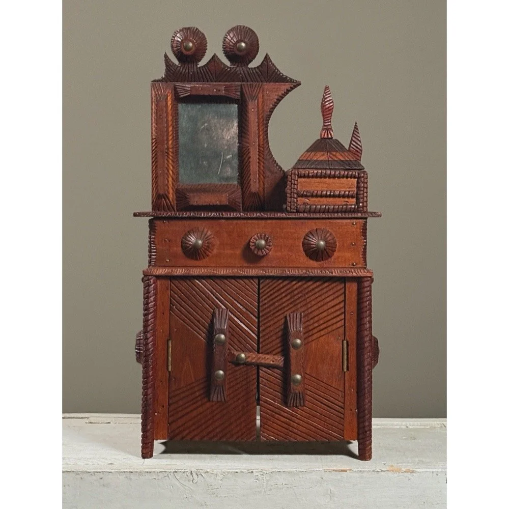Full view of antique chip-carved tramp art miniature dresser