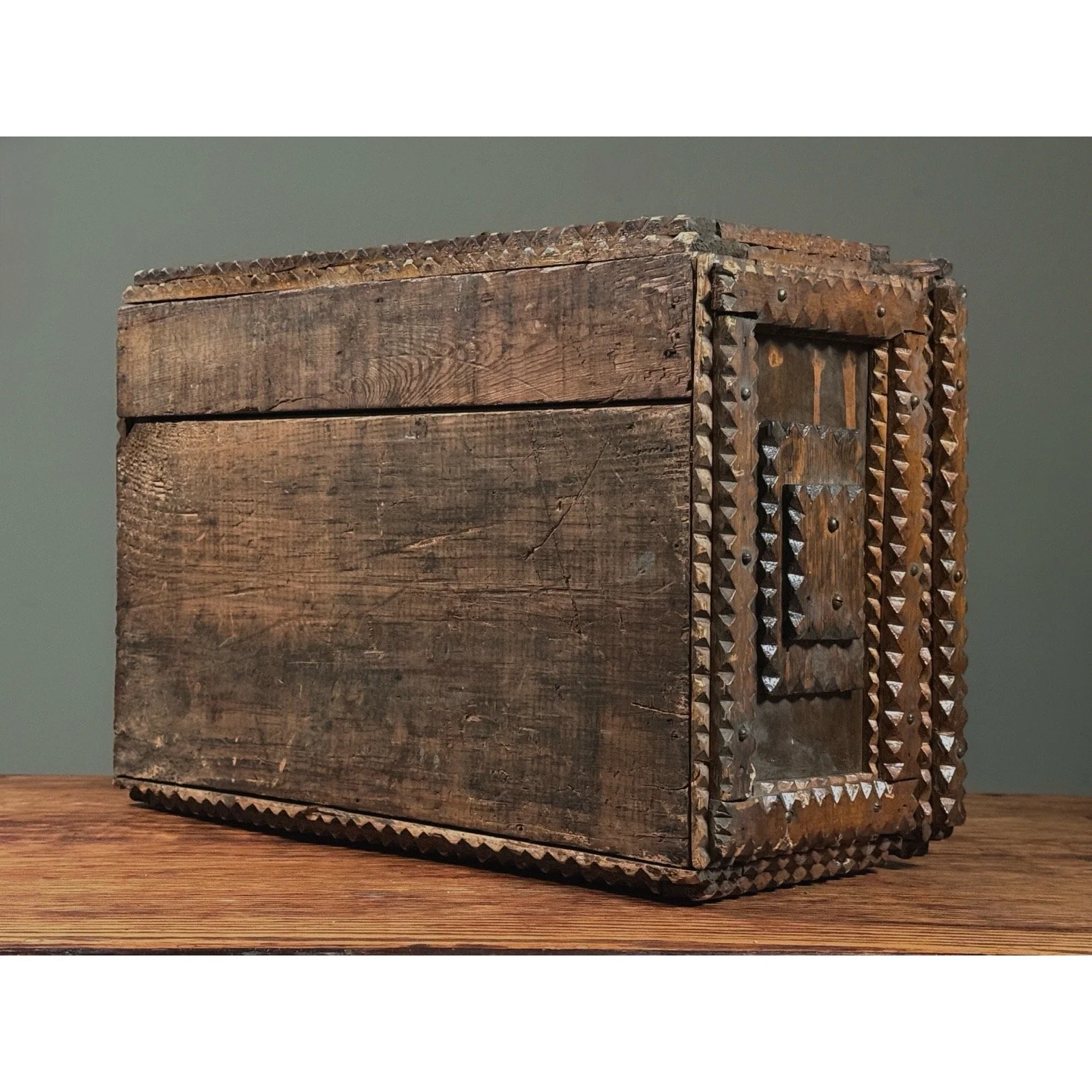 Monumental antique tramp art chip-carved chest, bottom view.