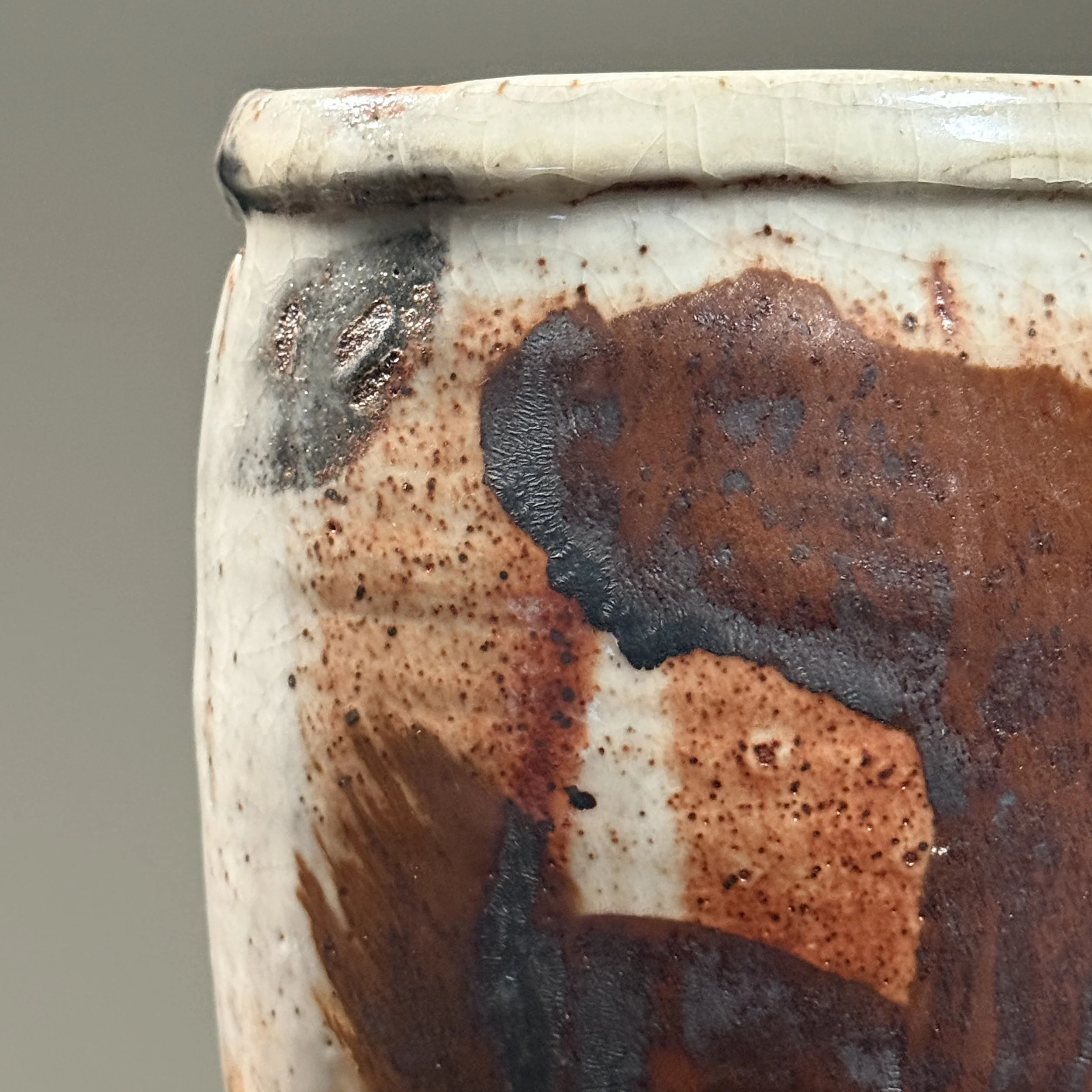Close-up of Shino crackle glaze. Fine crackle pattern throughout surface.