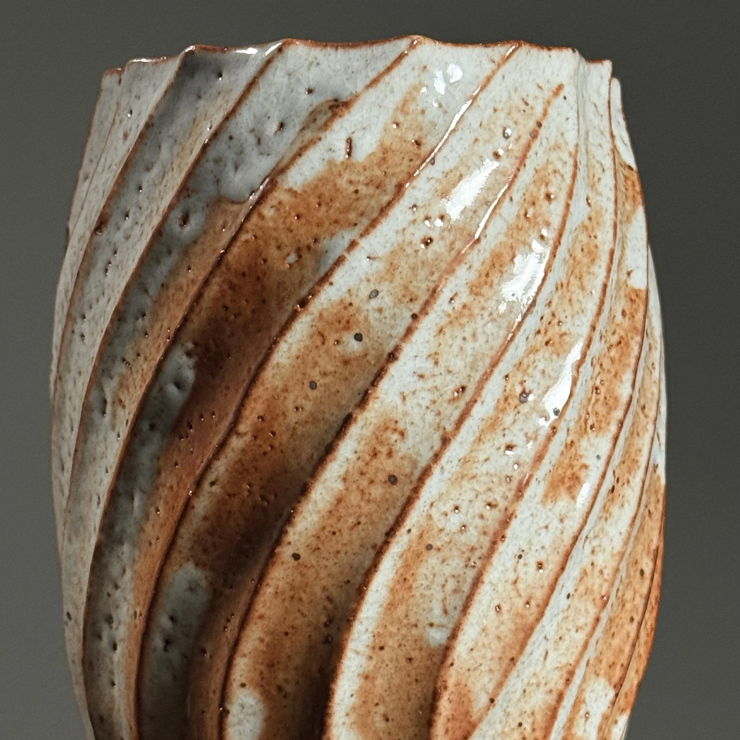 Detail of the Shino glaze surface showing thick white field.