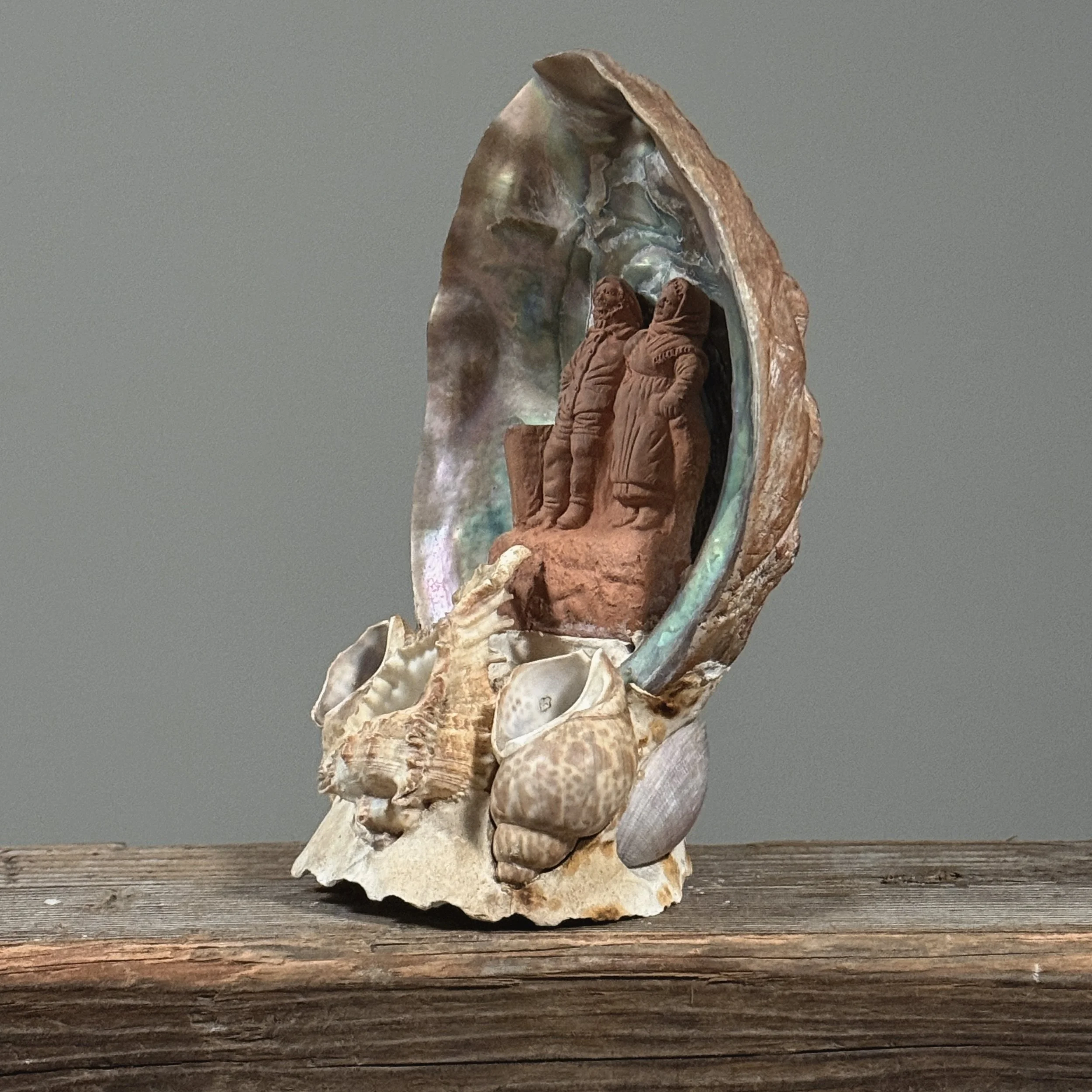 Attributed to Pierre-Adrien Graillon, French terracotta couple in abalone shell, Dieppe folk art
