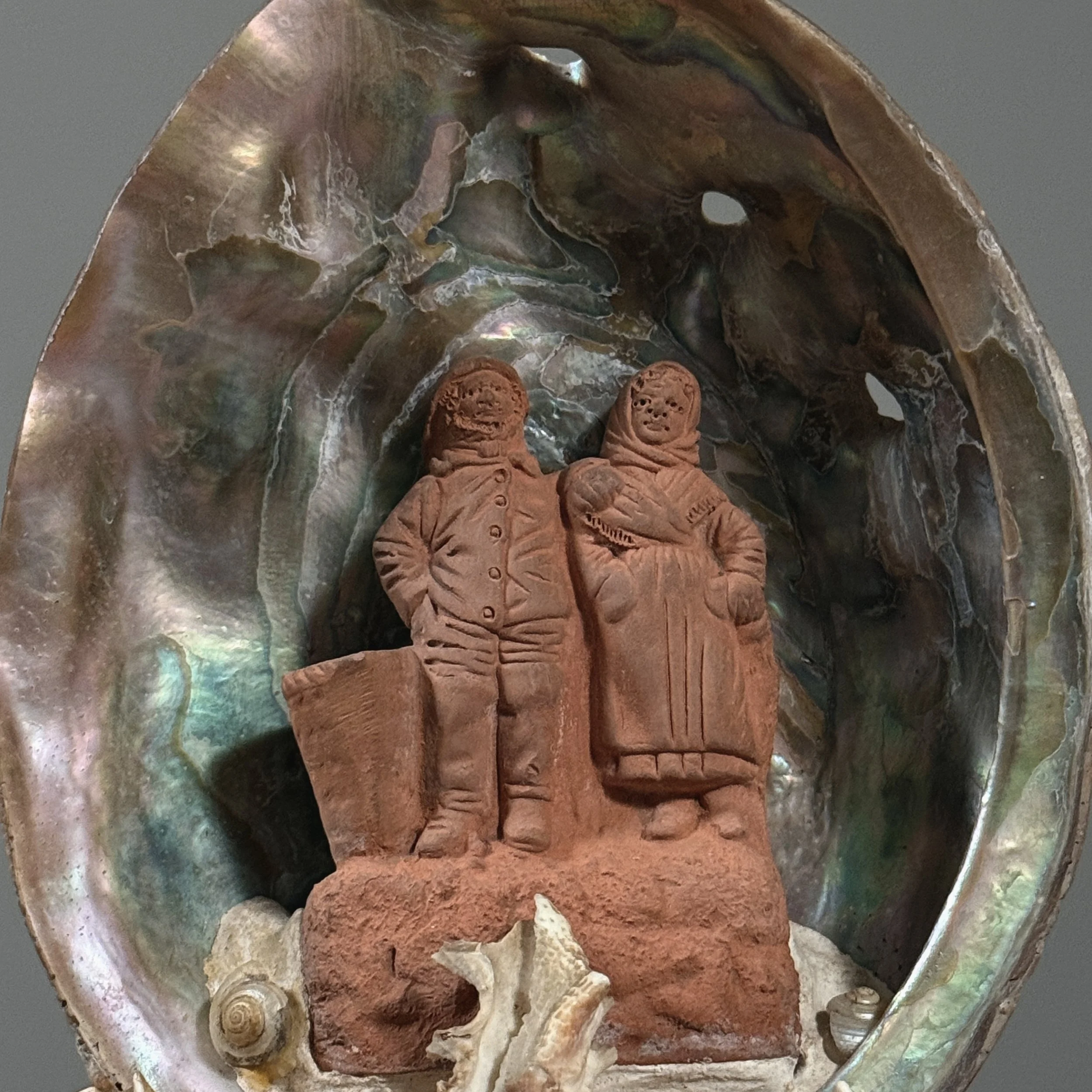 Attributed to Pierre-Adrien Graillon, French terracotta couple in abalone shell, Dieppe folk art