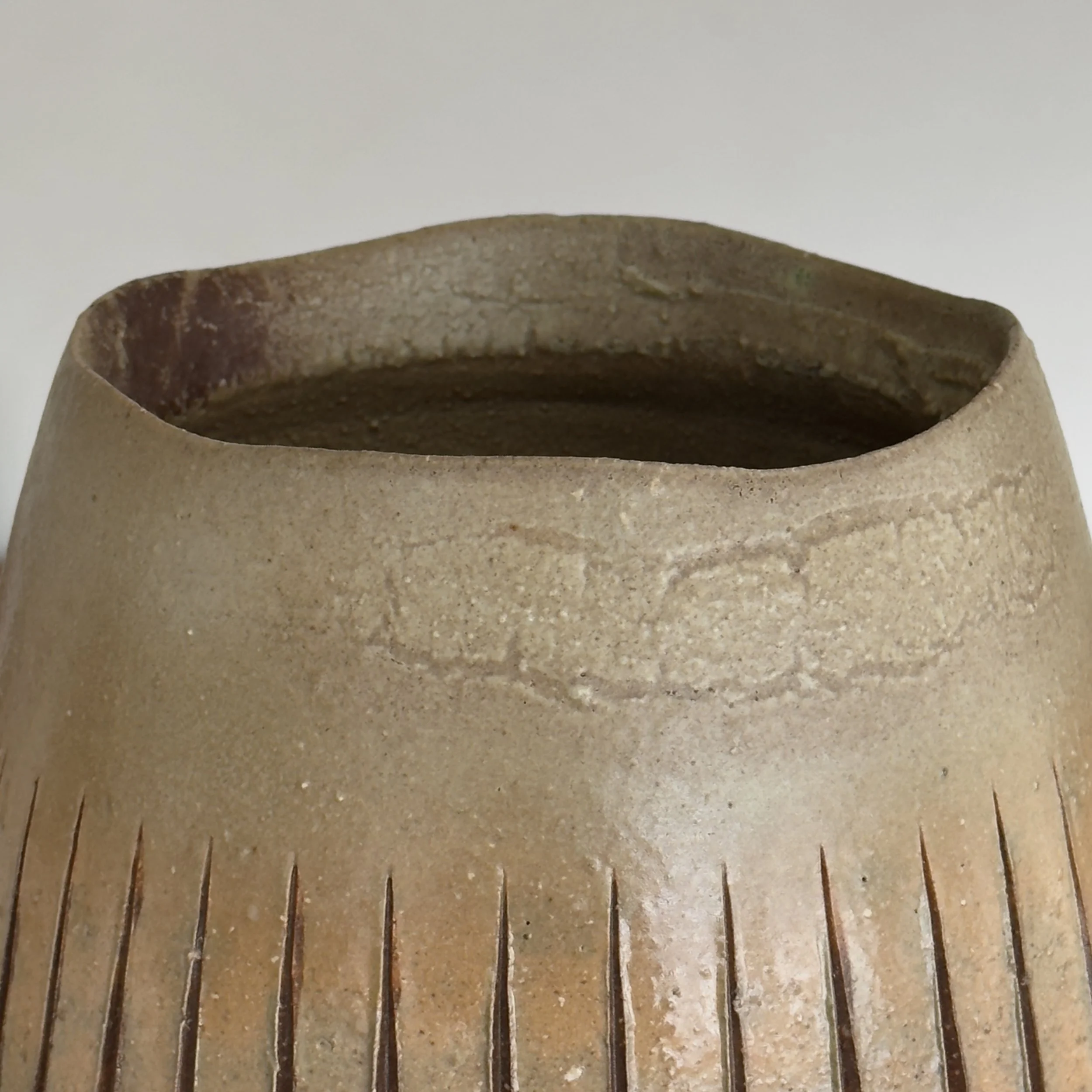 Wood fired surface detail, ash and flame effects, stoneware vessel