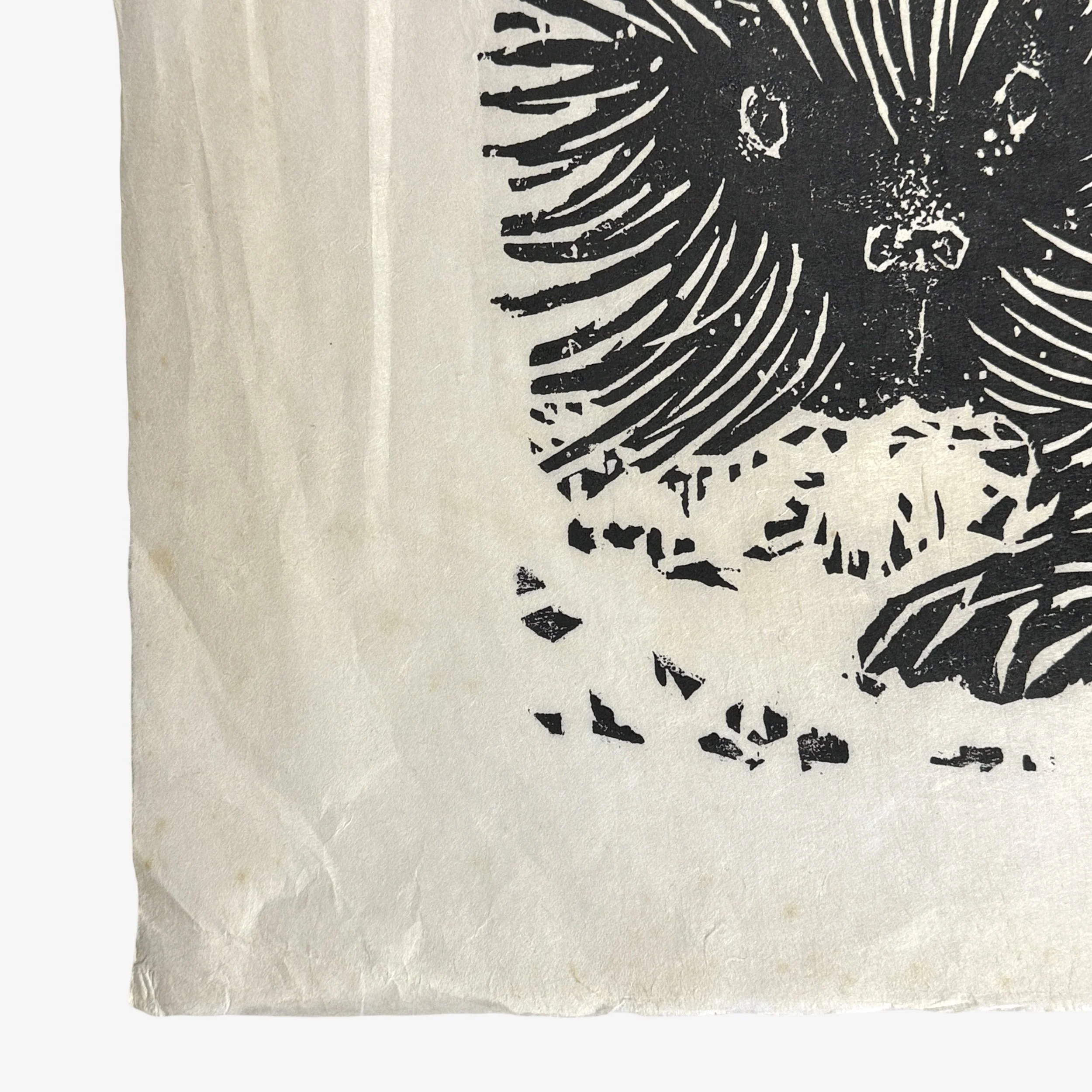 Hand-torn paper edge on Richard Hood woodcut