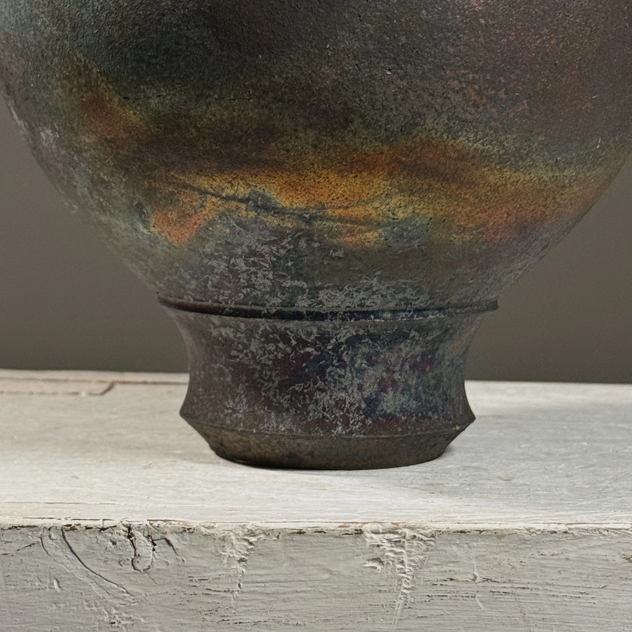Surface detail. Iridescent variations across exterior.