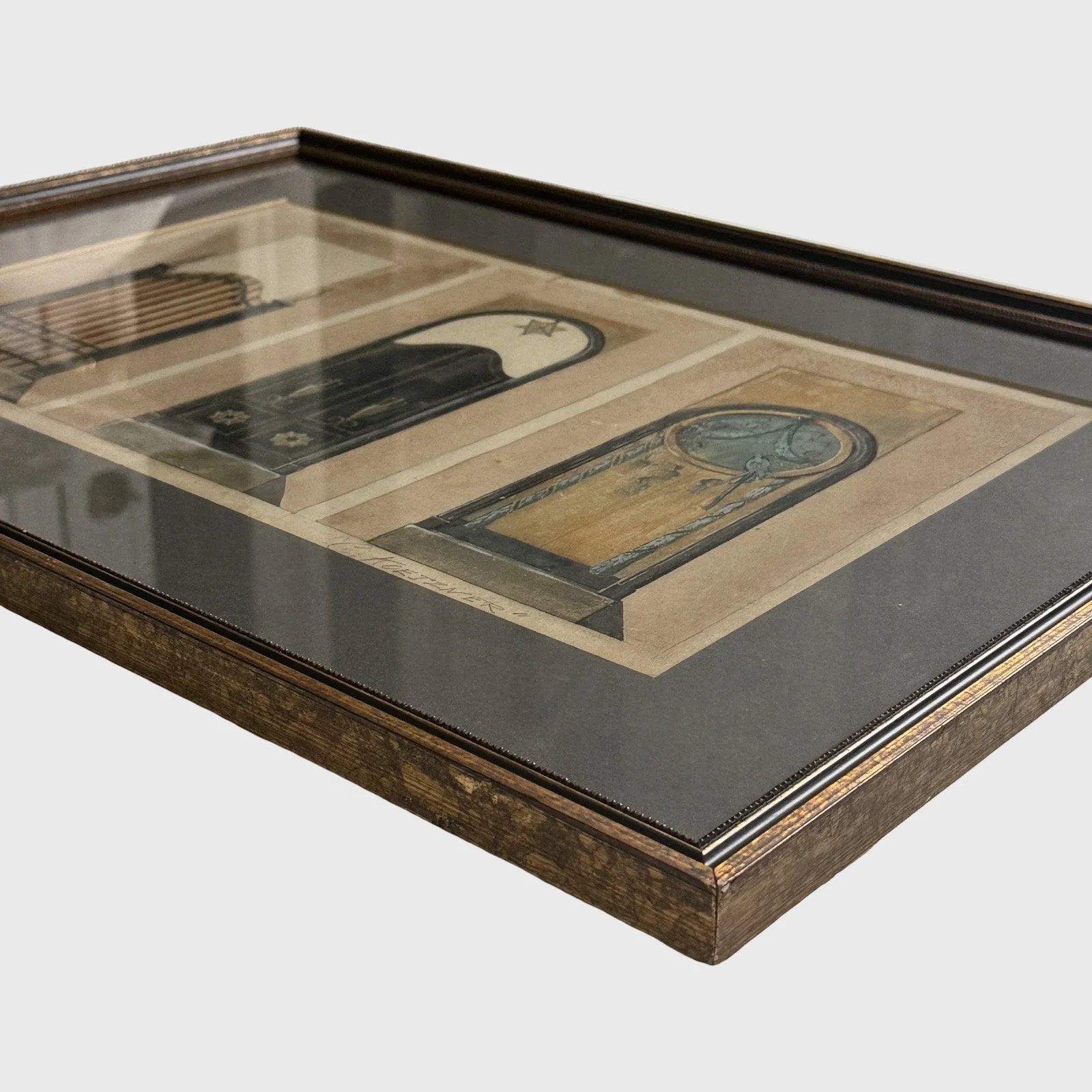 Bronzed gilt frame with beaded trim and archival mat surrounding architectural study
