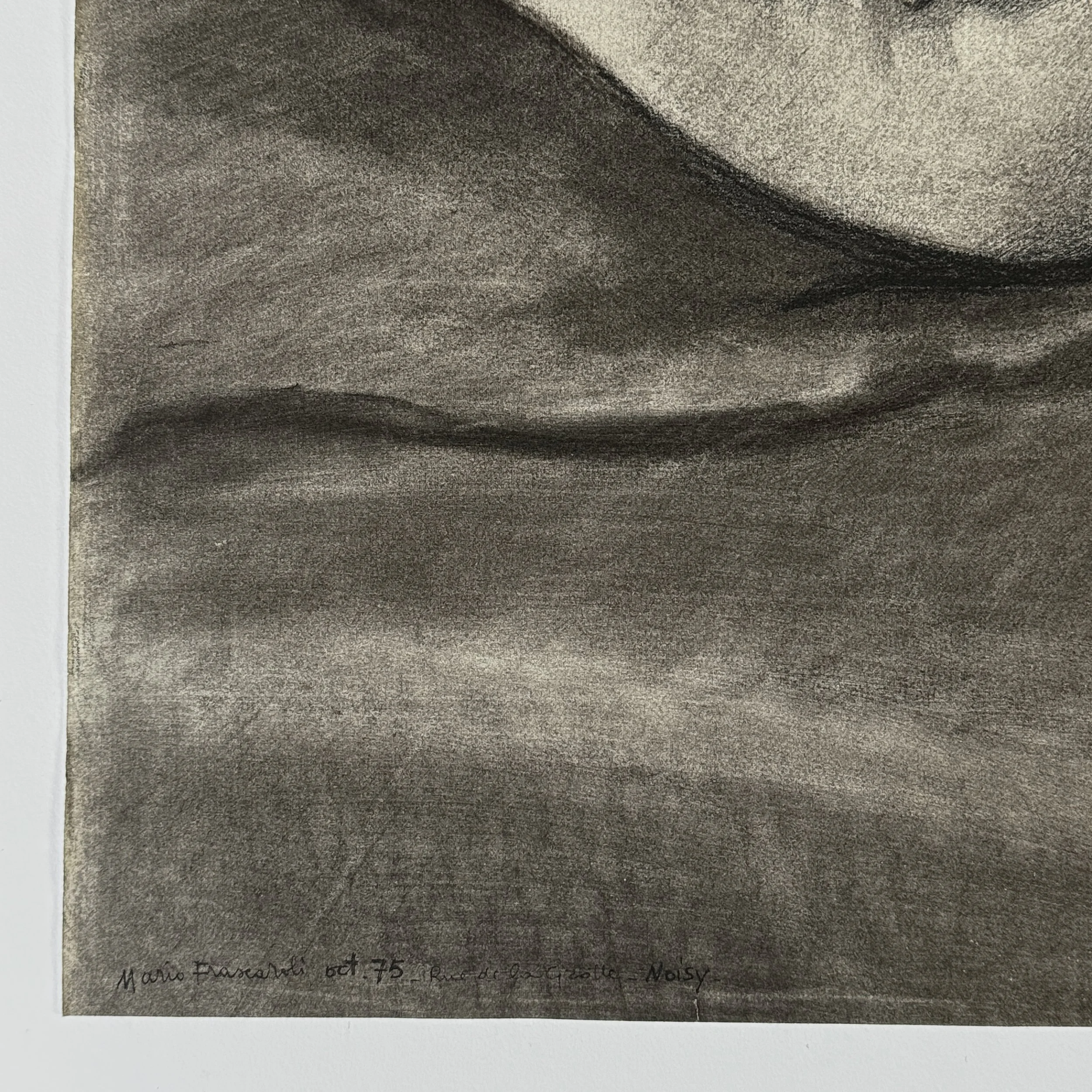 Artist’s signature in lower left corner of drawing