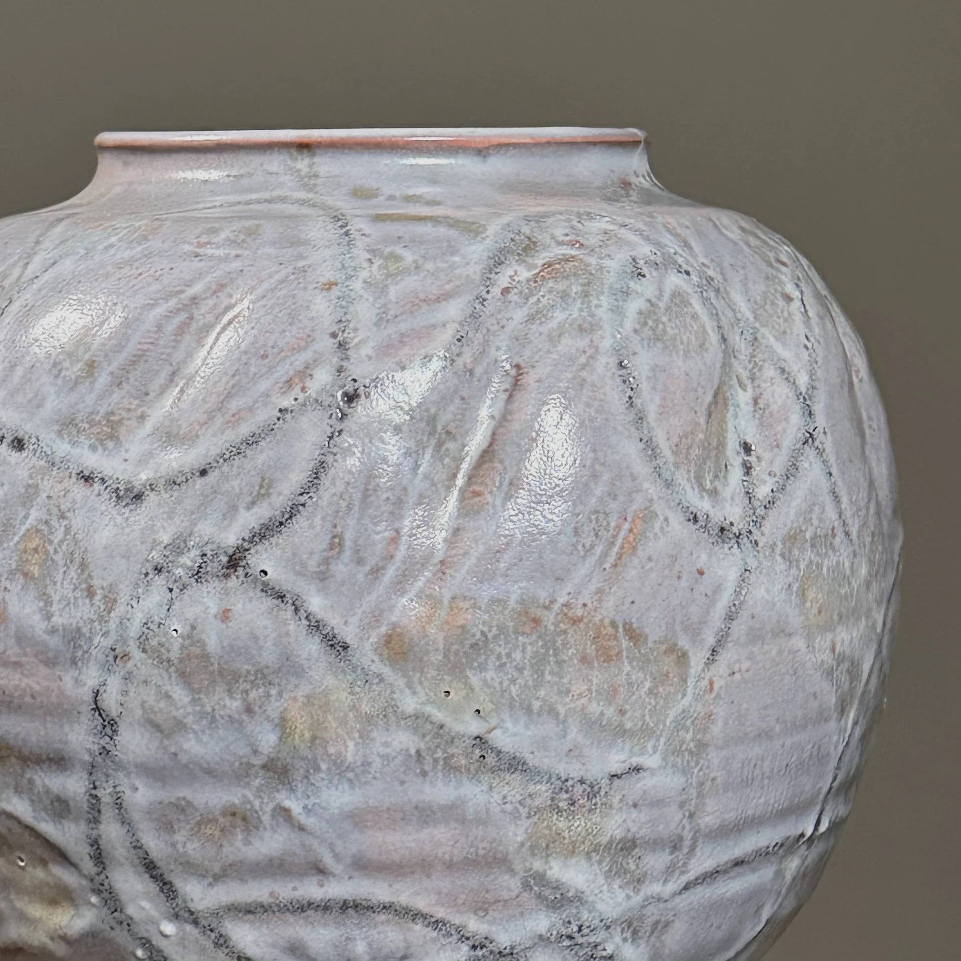 Close-up of the purple glaze texture and finish.