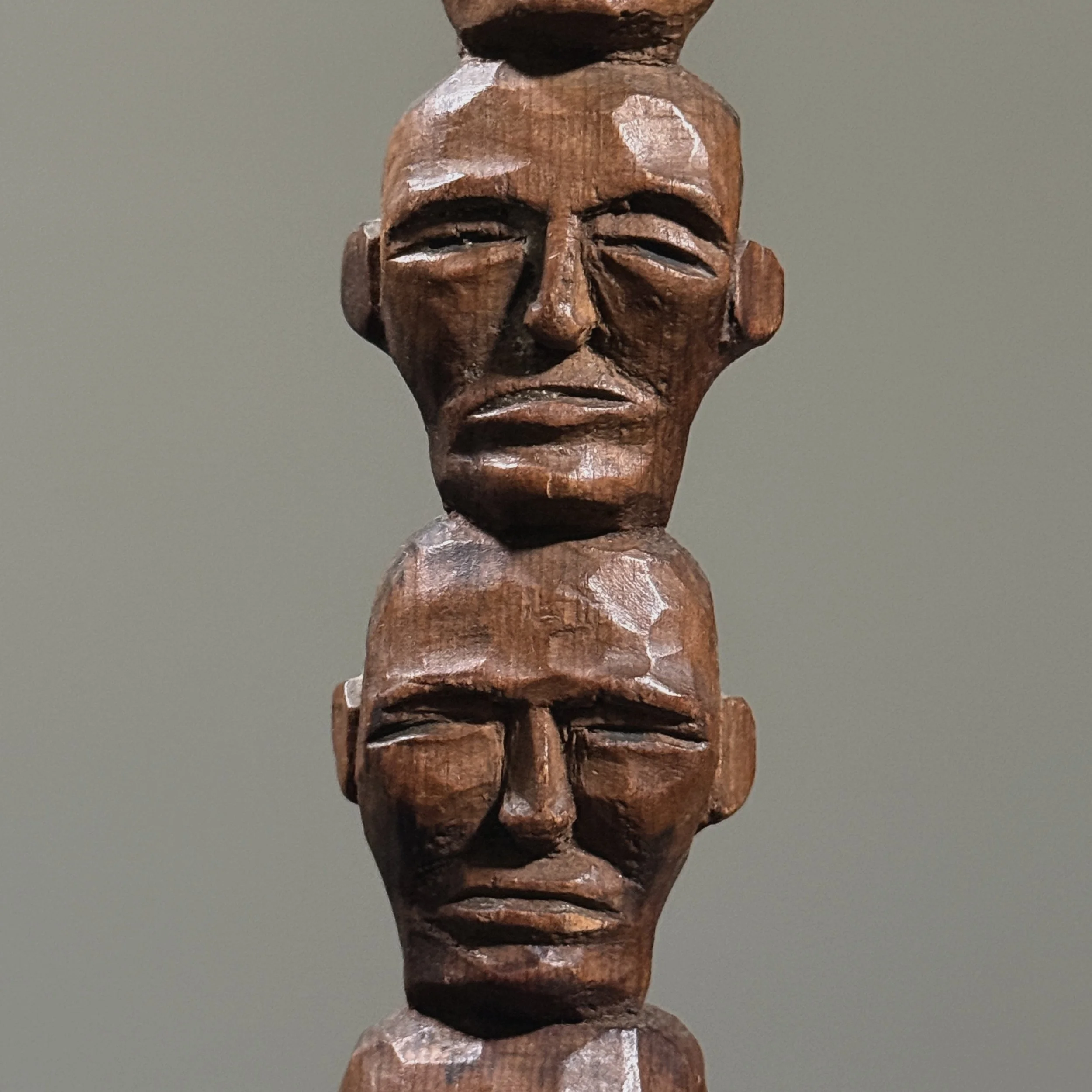 Aged surface detail of folk art wood carving