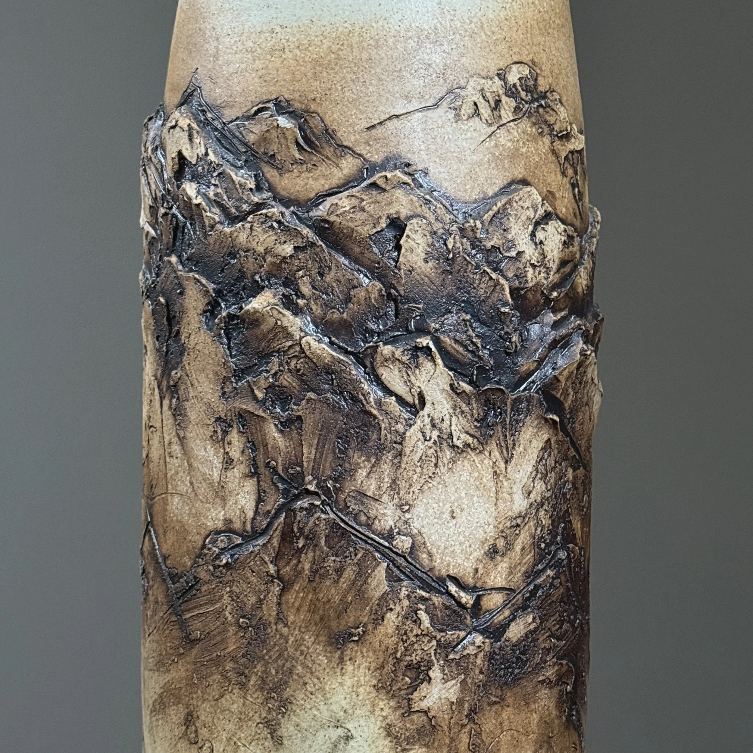 Dimensional clay sections creating architectural surface