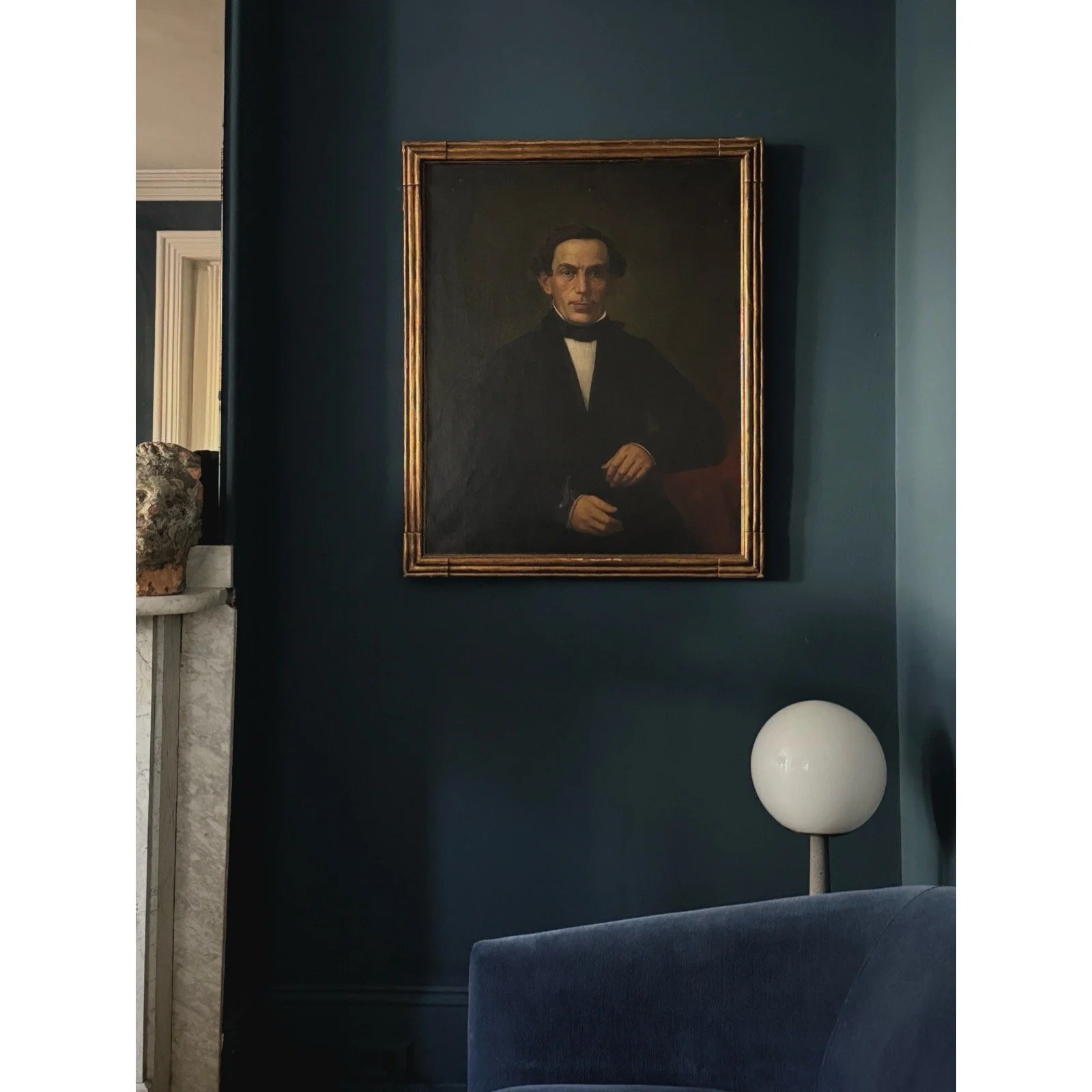 Installation view demonstrating the portrait's scale and presentation in an interior setting.