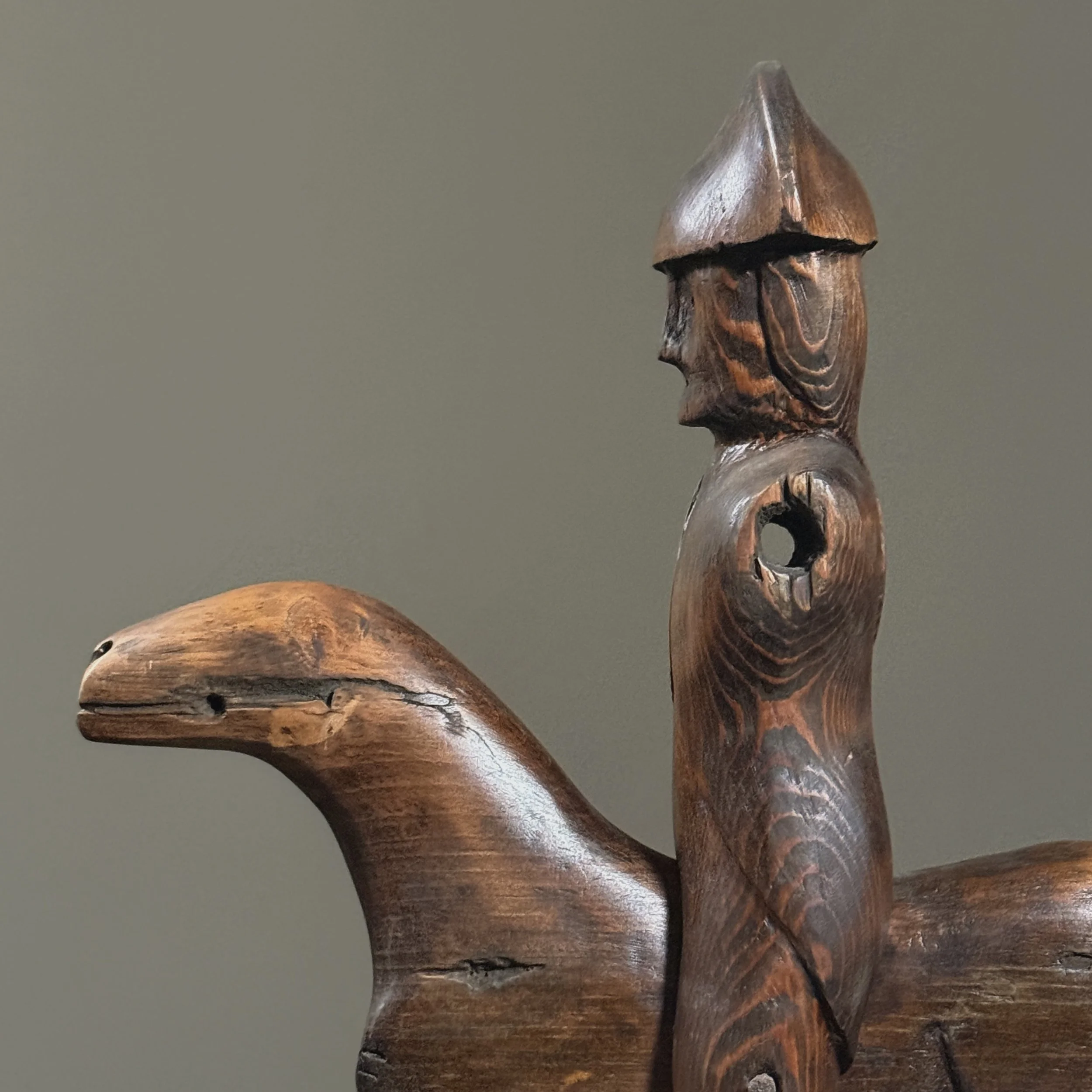 Angle showing deliberate arm omission as part of design.