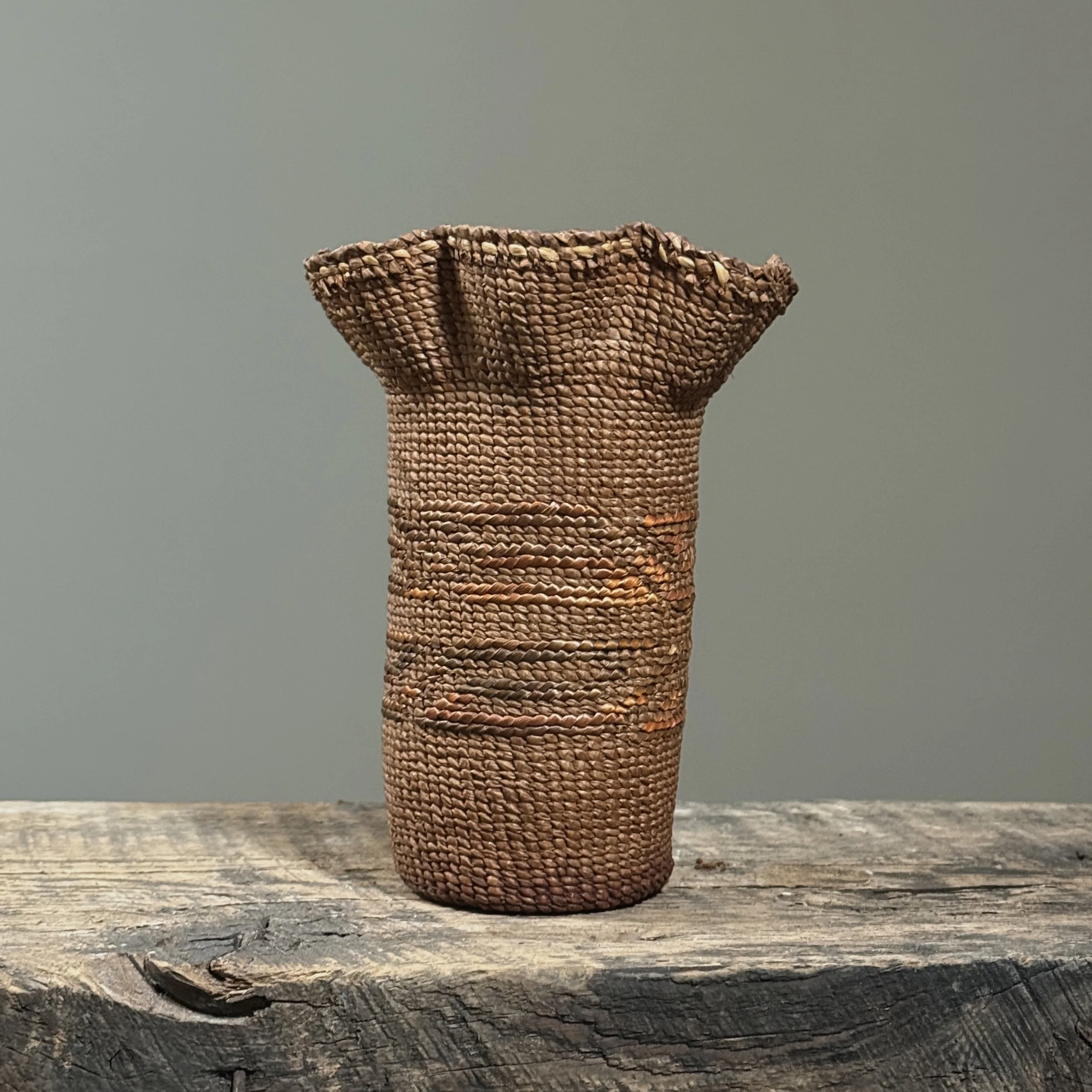 Antique Tlingit cedar bark basket with flared ripple rim