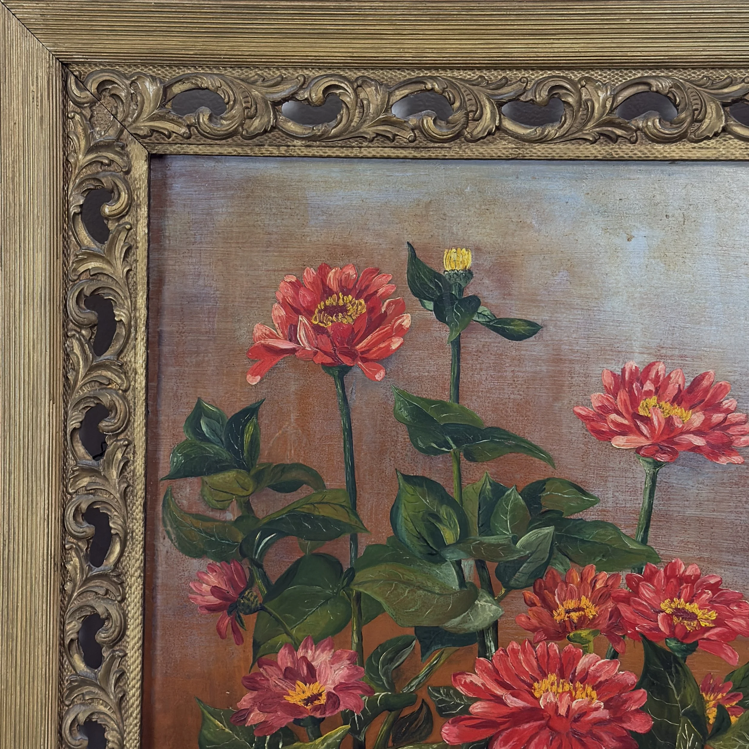 Scroll cut-out frame detail, coral zinnia still life