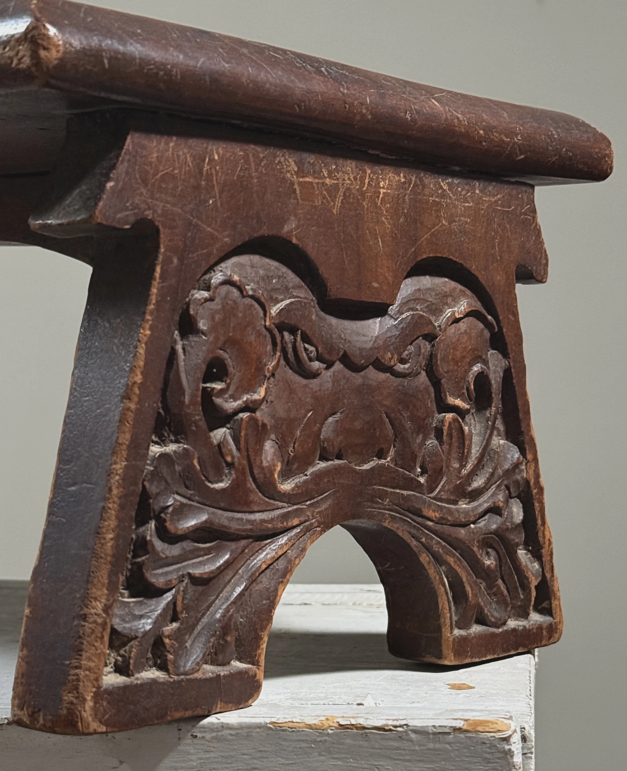 Antique hand-carved Gothic English step stool with scrolled lion and Green Man carvings