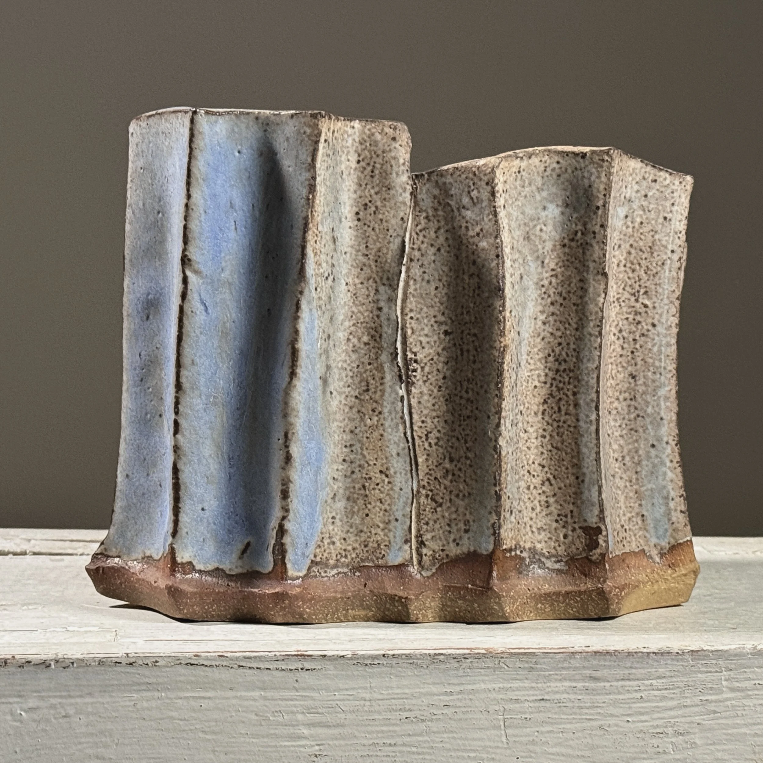 Angle emphasizing the sculptural quality of the form.