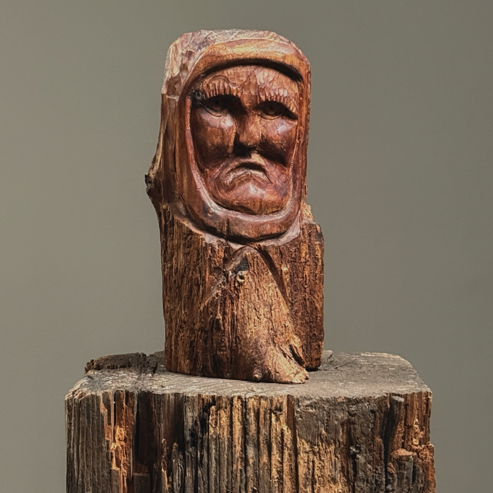 Vintage hand-carved folk art portrait in tree branch, signed with initials