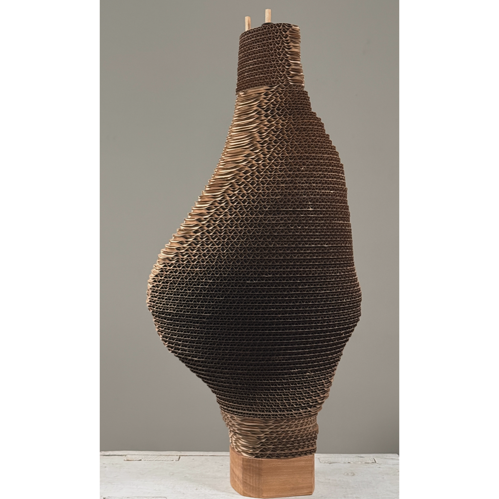 Vintage biomorphic postmodernist corrugated cardboard sculpture on carved wood base