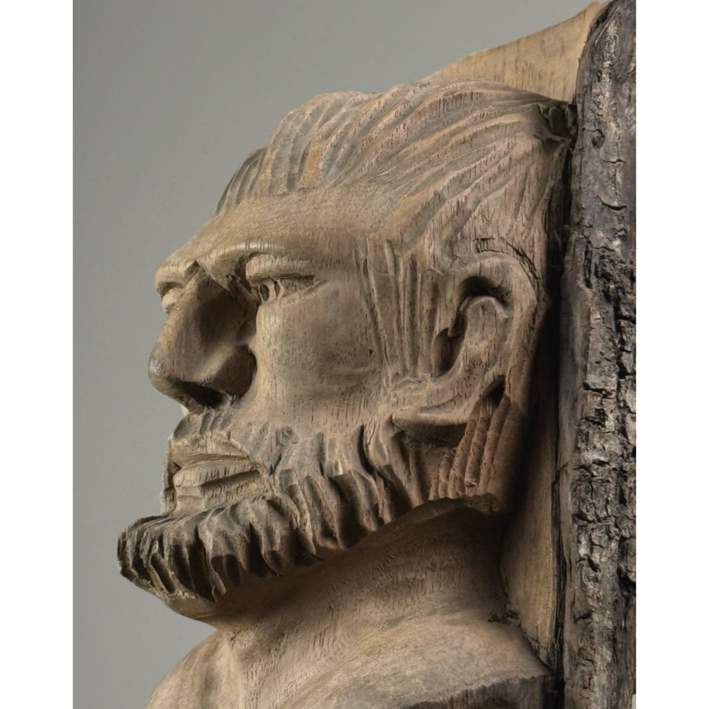 Vintage hand-carved folk art portrait of a bearded man sculpture