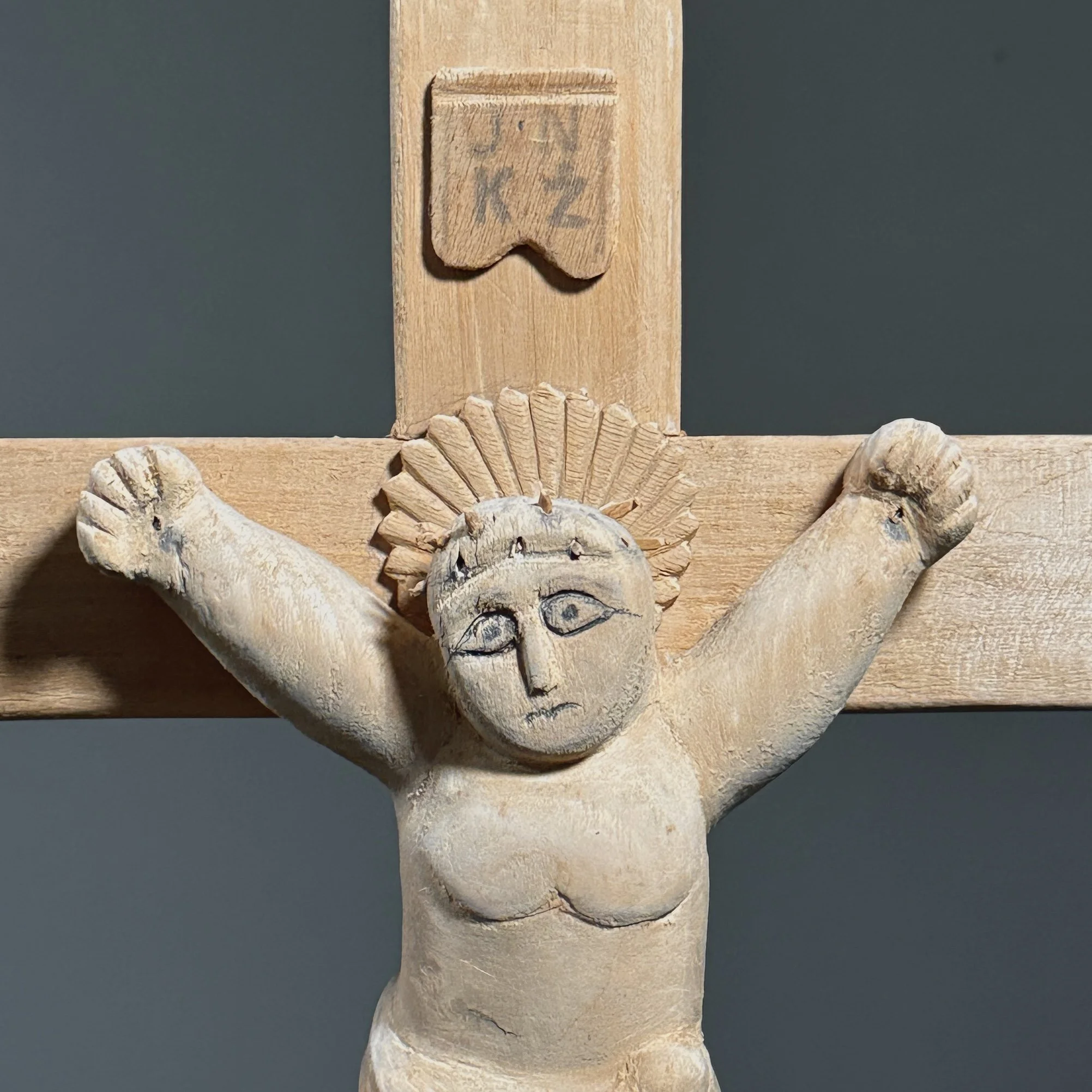 Close-up of carved crown of thorns on wooden Christ figure
