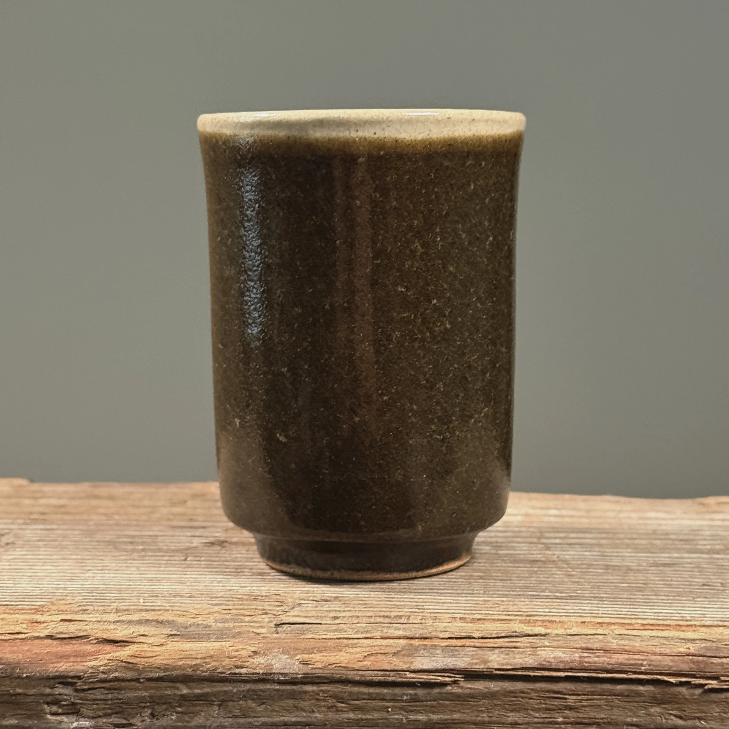 Back view of brown cup.