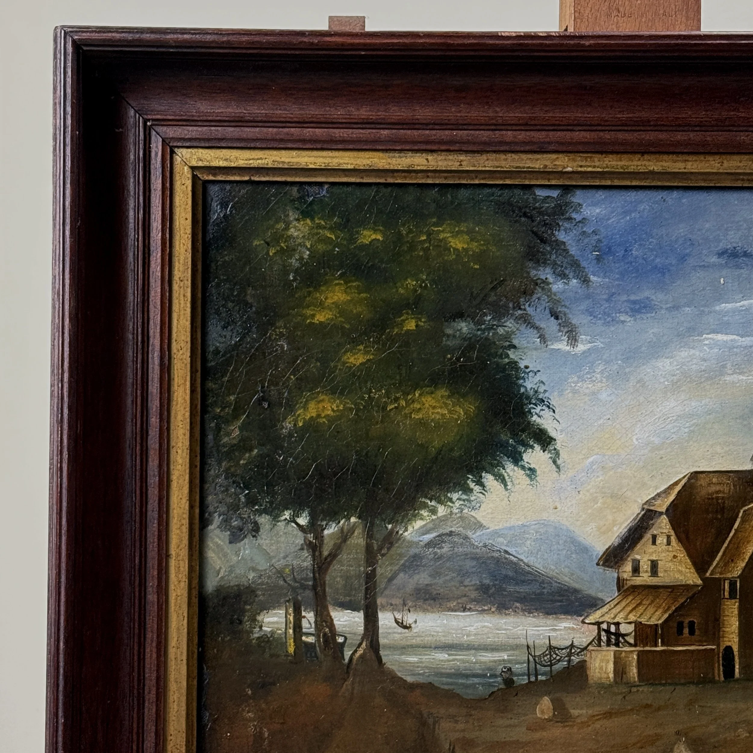 Frame corner. Wood frame. Gold inset trim detail.