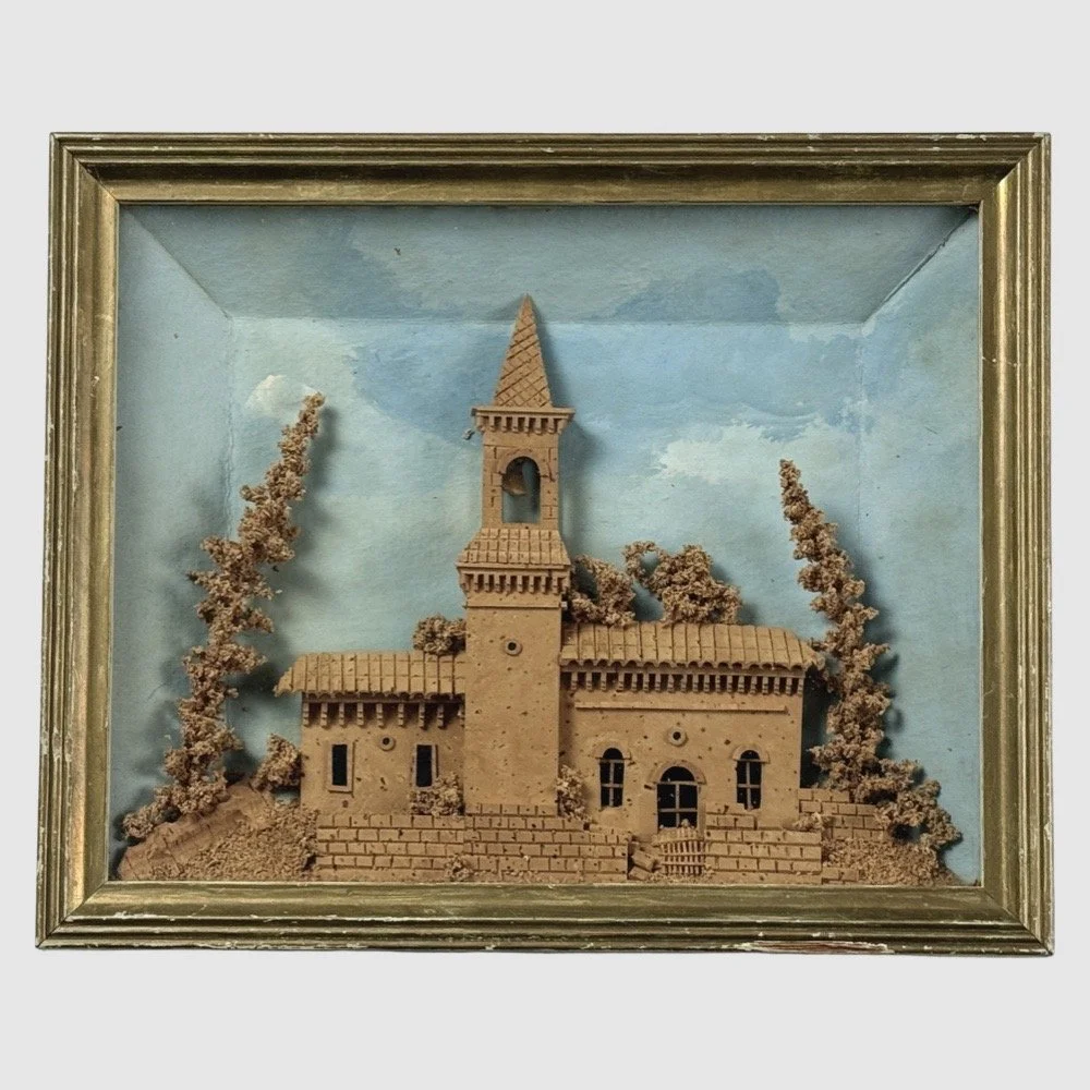Antique cork diorama of abandoned church with bell tower under glass frame